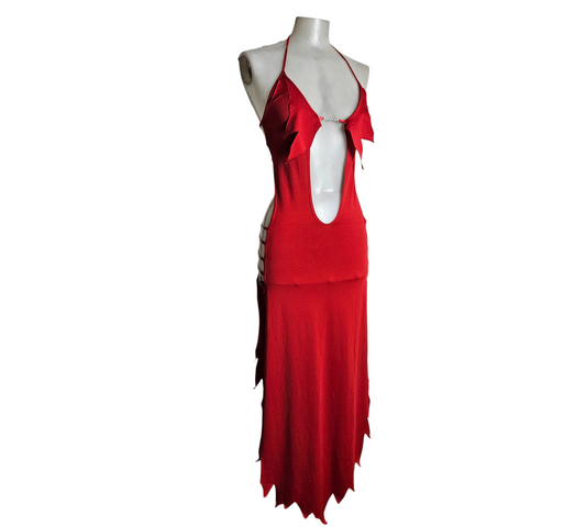 A fierce and bold Y2K-inspired red maxi dress with a halter neck, featuring daring side cut-outs with rhinestone details and a mystical, jagged handkerchief hem for a dark fairycore or pop-star aesthetic.