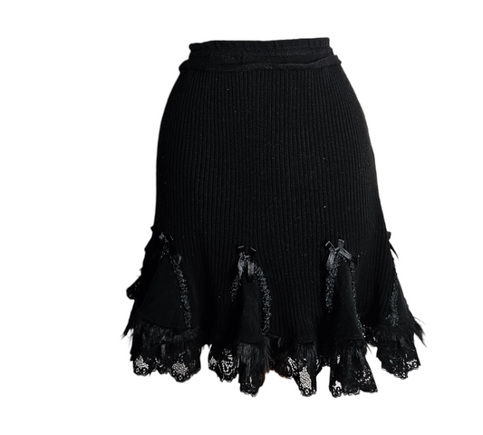Vintage black ribbed mini skirt with lace and textured trim, dark fairycore and whimsigoth Y2K aesthetic with gothic romantic details.