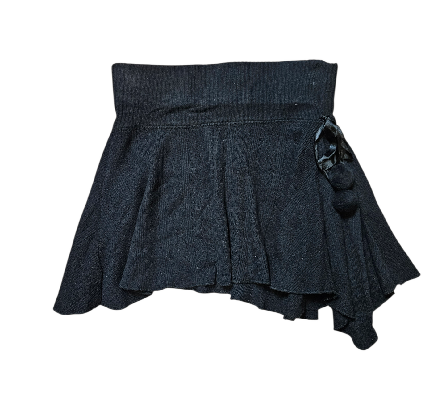 Asymmetrical mini skirt with pom-pom details
