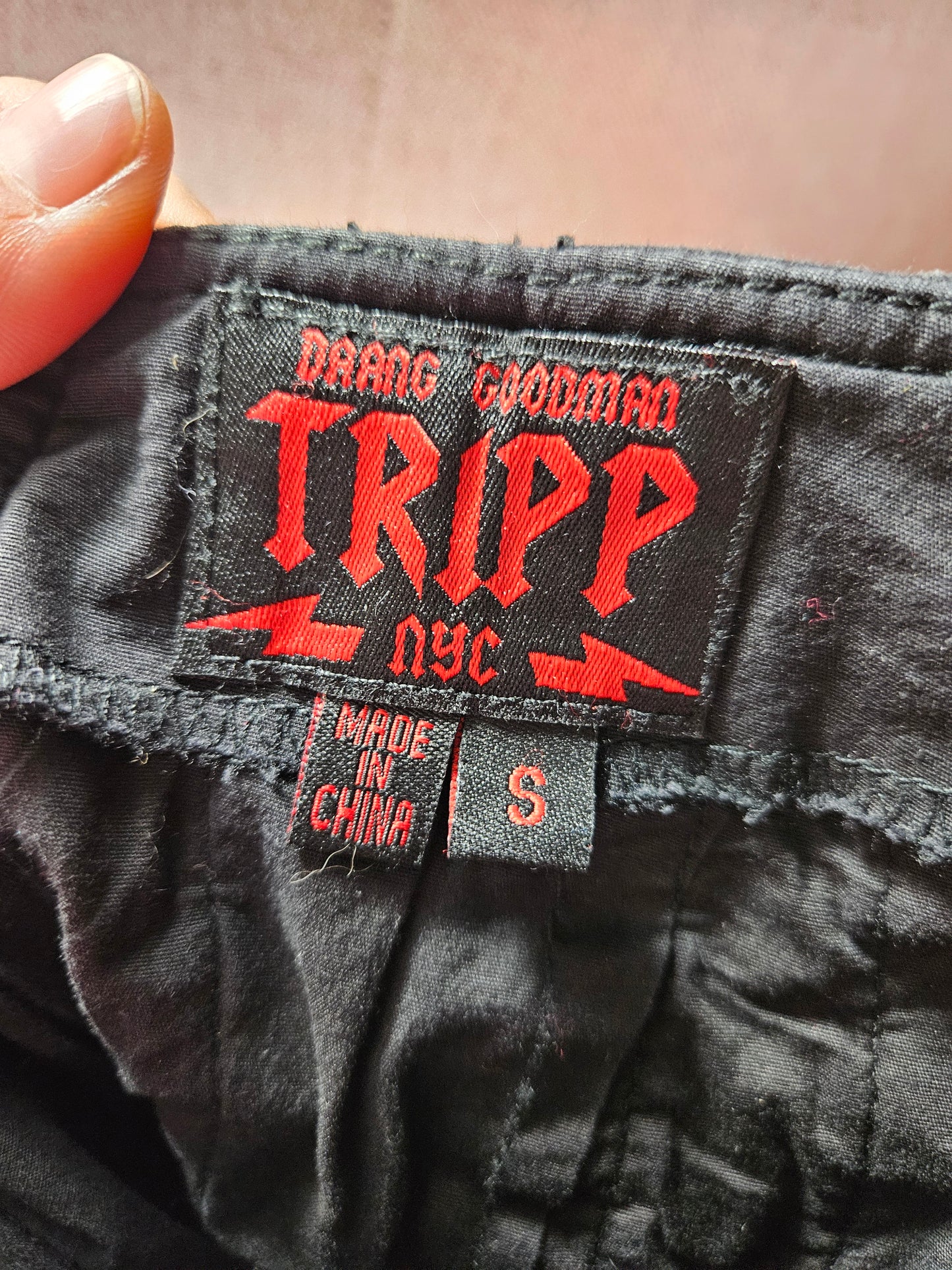 Tripp NYC black lace-up skirt