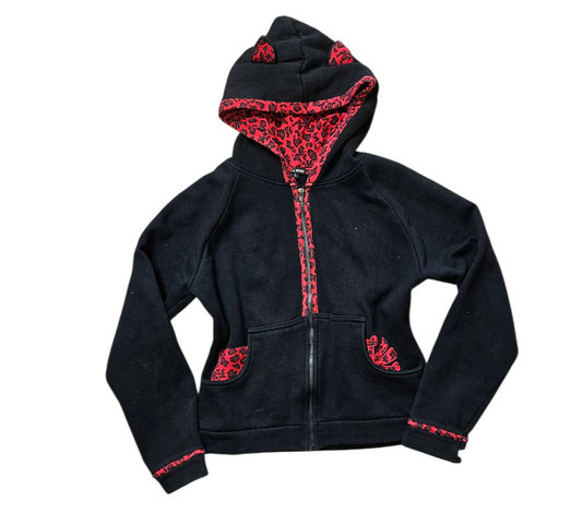 Vintage black cropped hoodie with red leopard lining and cat ear hood, bold Y2K fairycore and whimsigoth aesthetic with playful alt vibes.