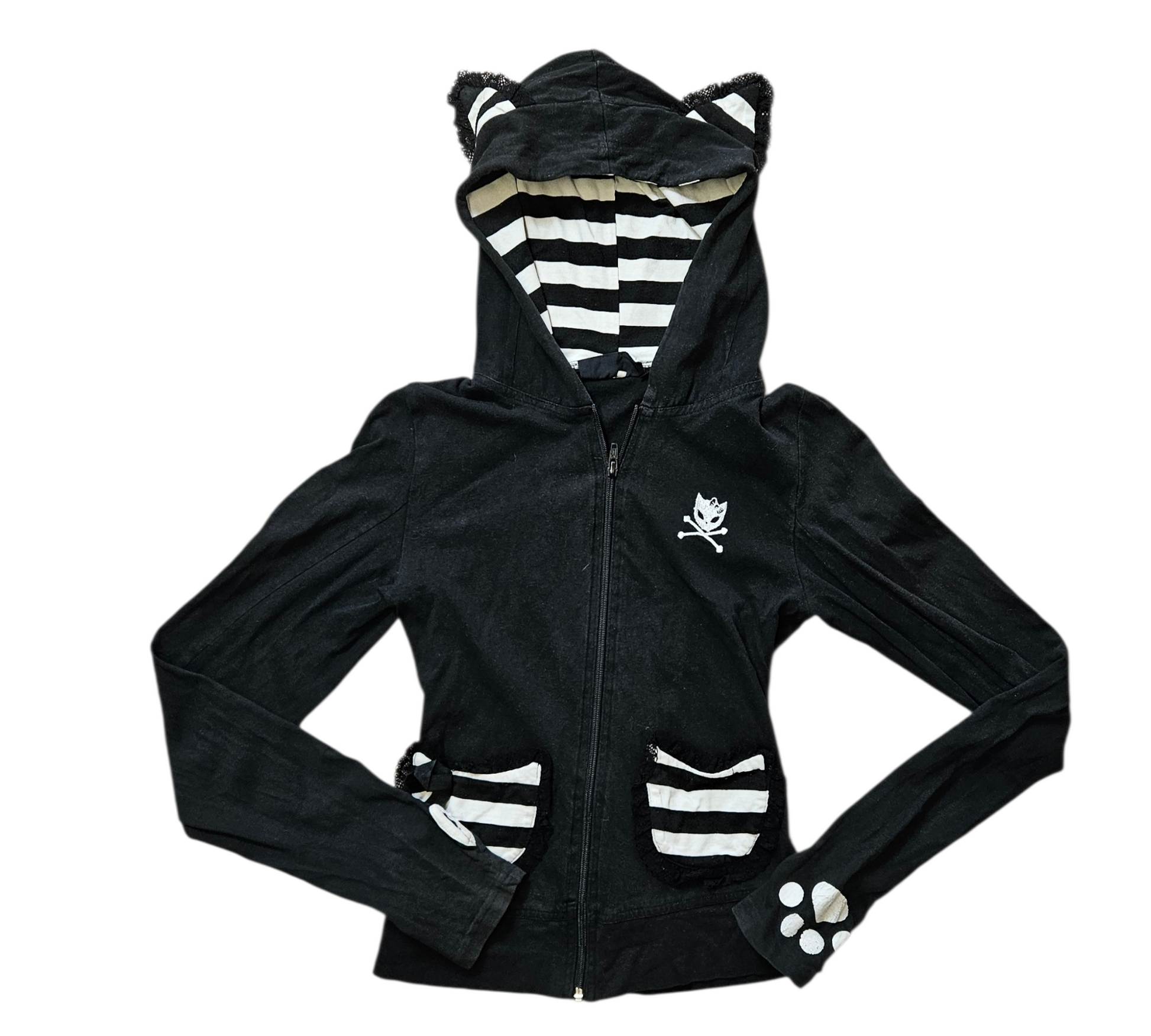 A striking Y2K goth-loli black hoodie featuring a cat-skull logo, striped ruffle pockets with ribbons, and a bold corset-style lace-up back for a perfect dark reverie aesthetic.
