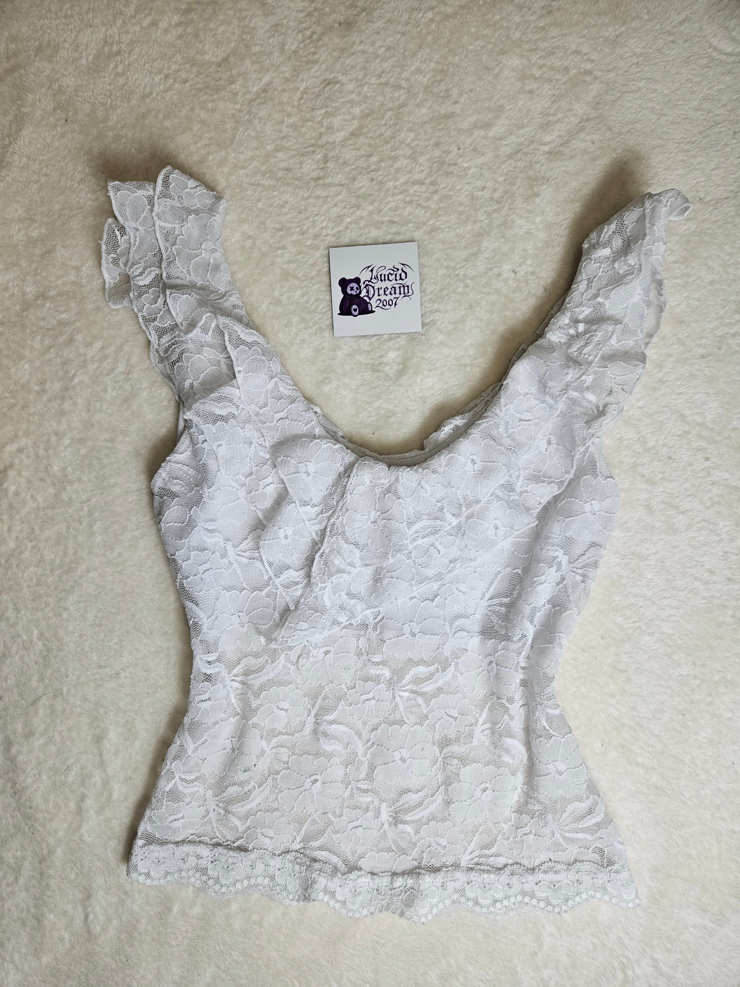 Haut en dentelle blanc