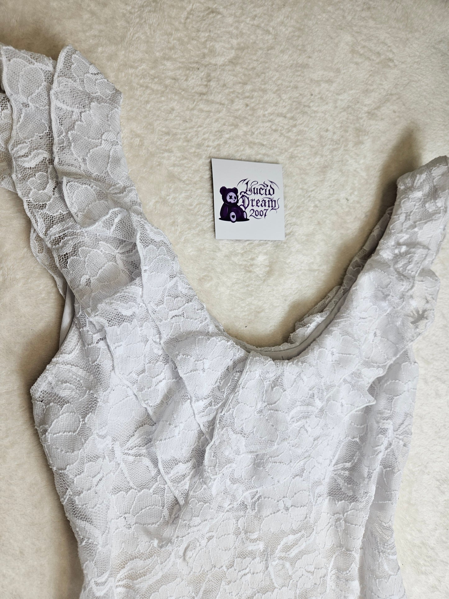 Haut en dentelle blanc