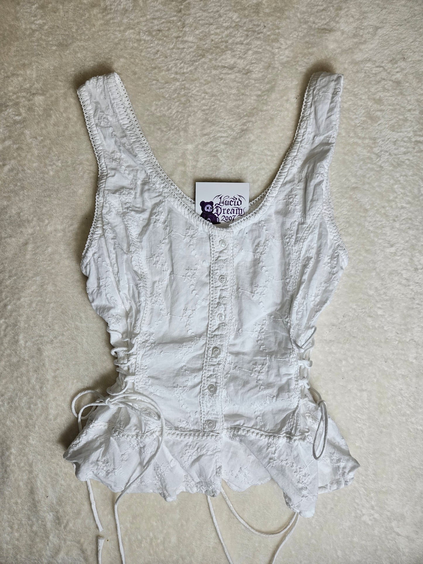 Haut blanc à laçage