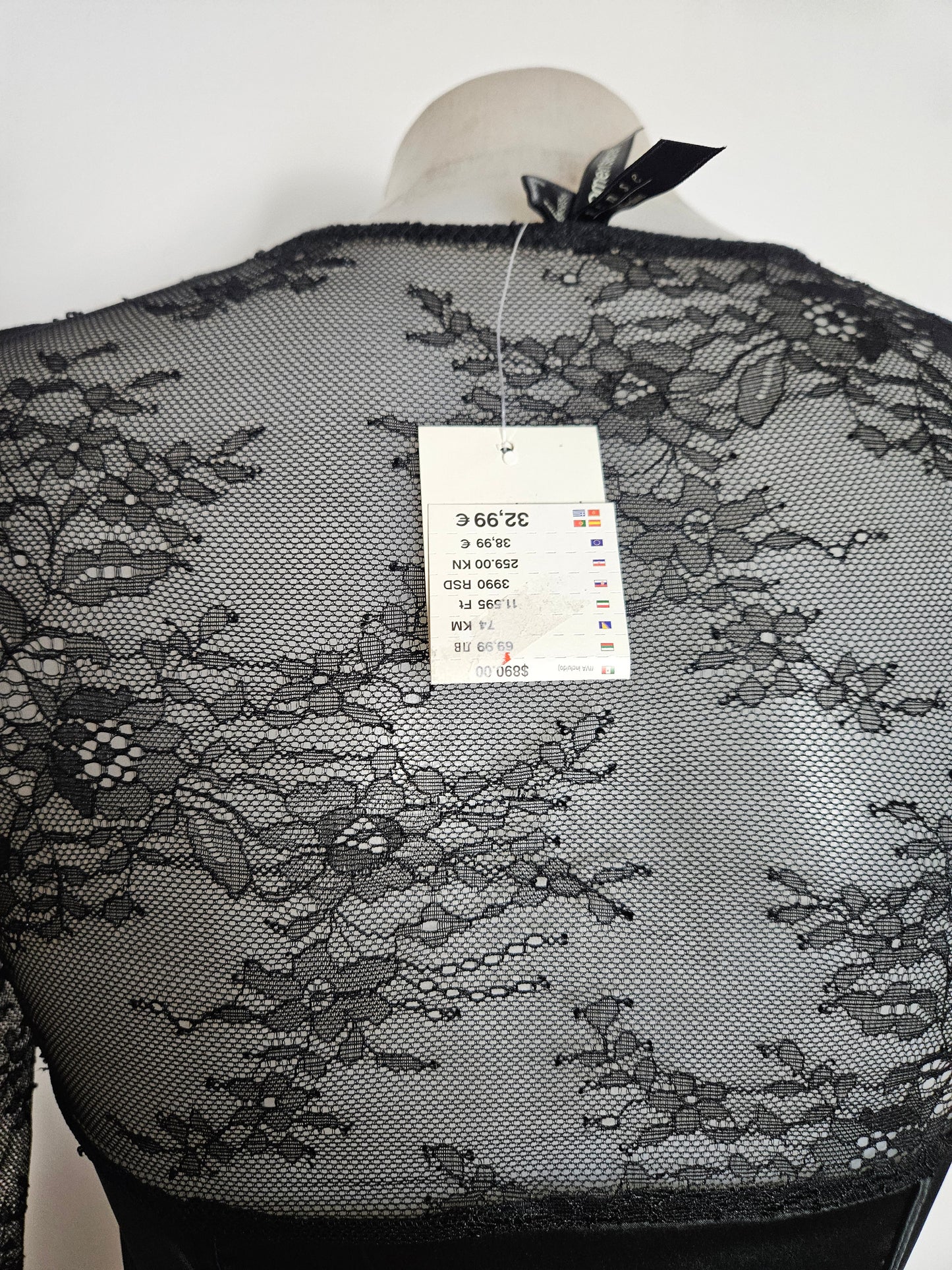 Lace and satin blouse with hook-and-eye closure