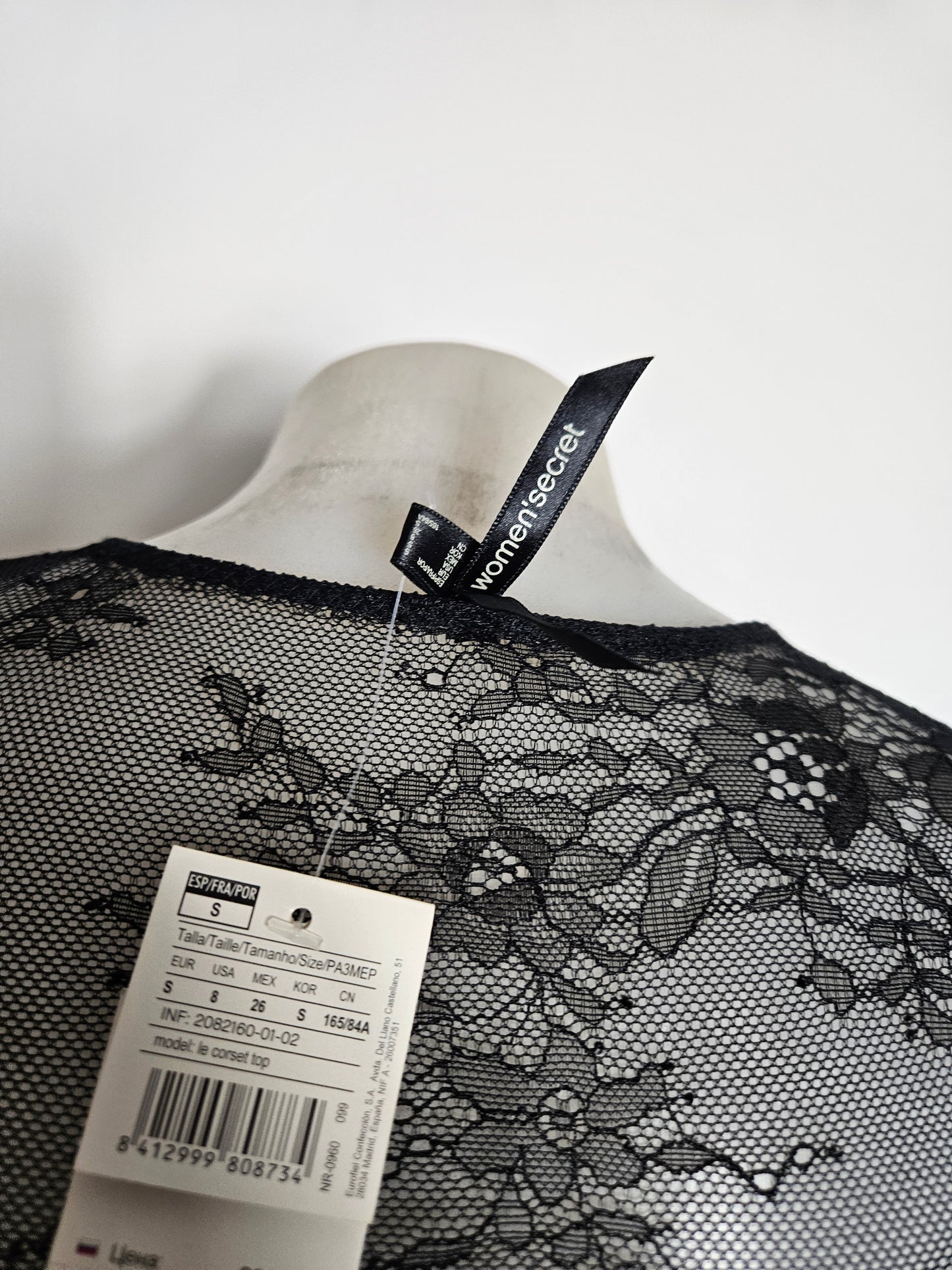 Lace and satin blouse with hook-and-eye closure