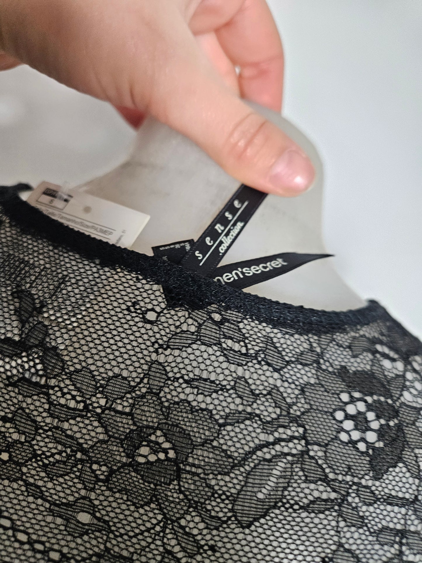 Lace and satin blouse with hook-and-eye closure