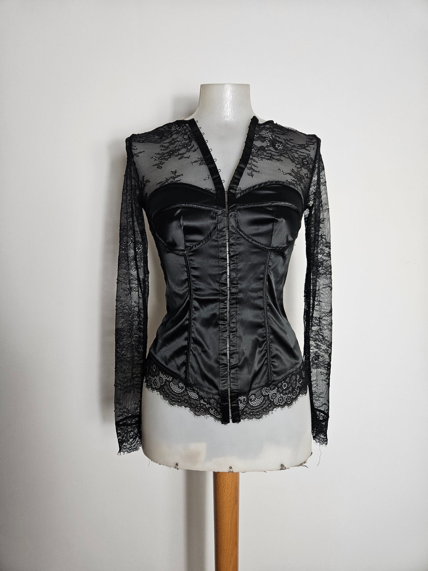 Lace and satin blouse with hook-and-eye closure