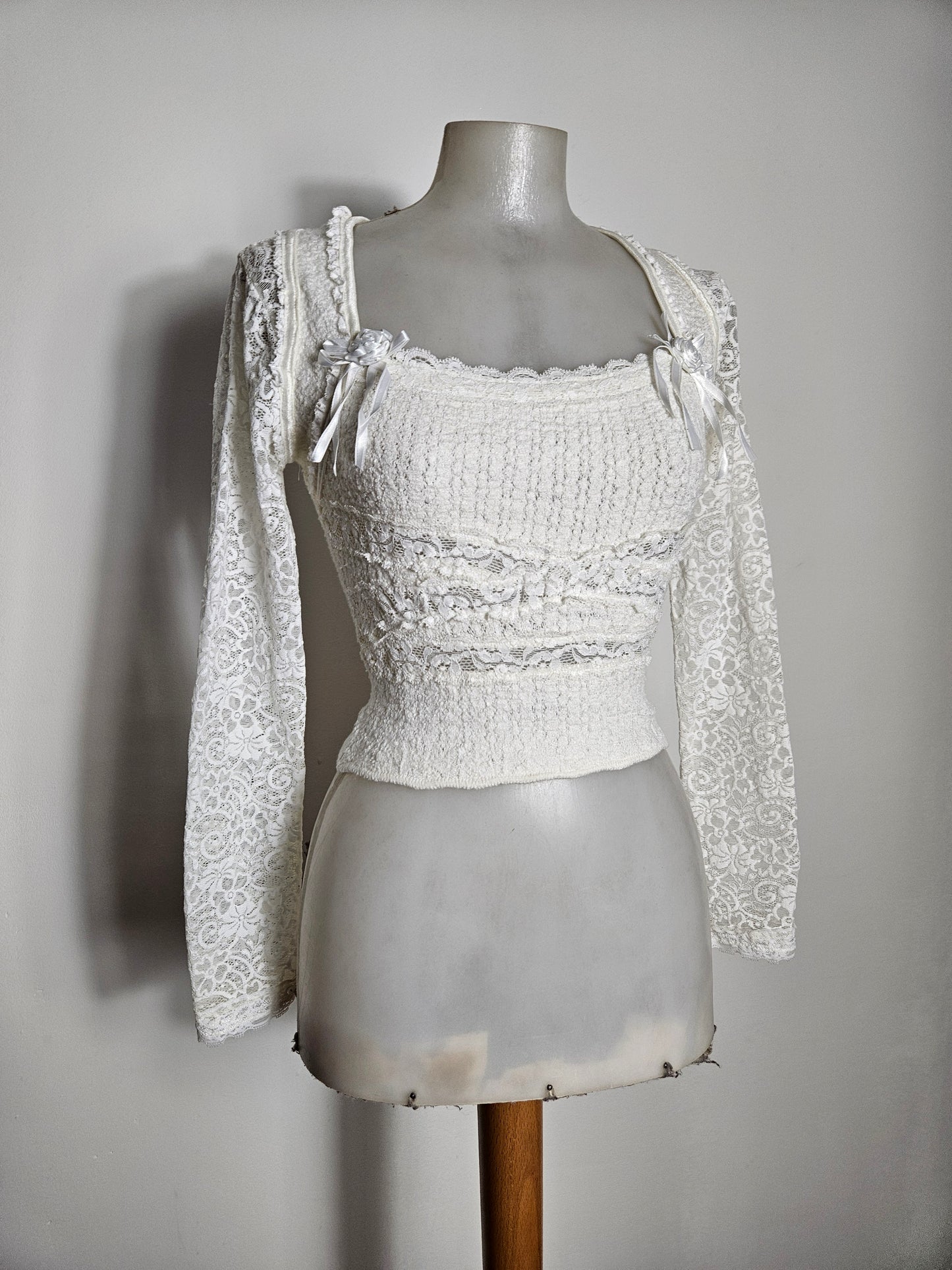 White lace top with floral details