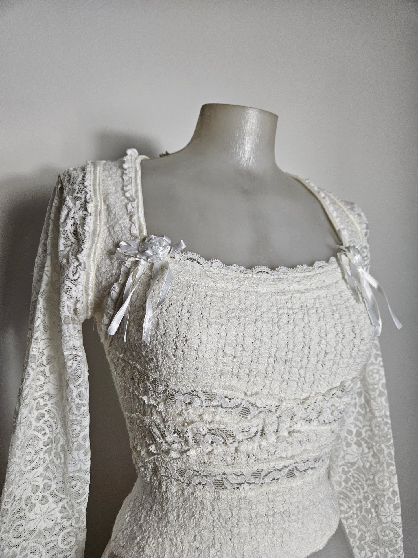 White lace top with floral details