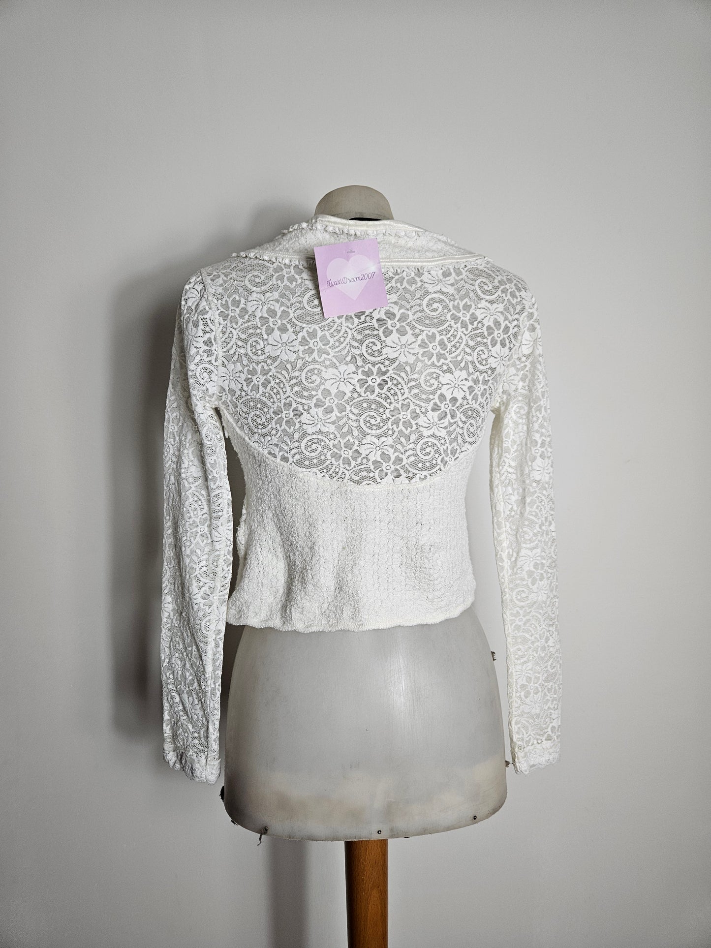 White lace top with floral details