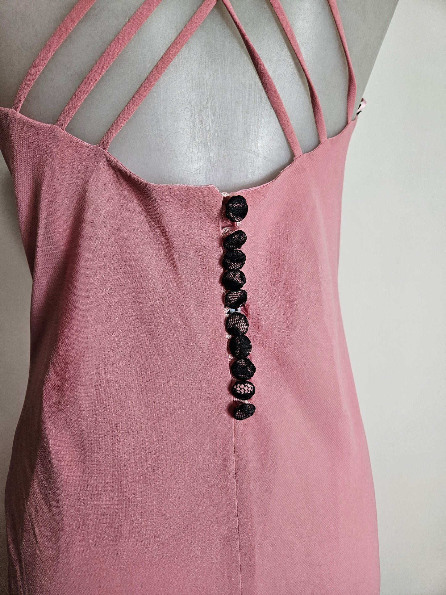 Pink dress with black lace details