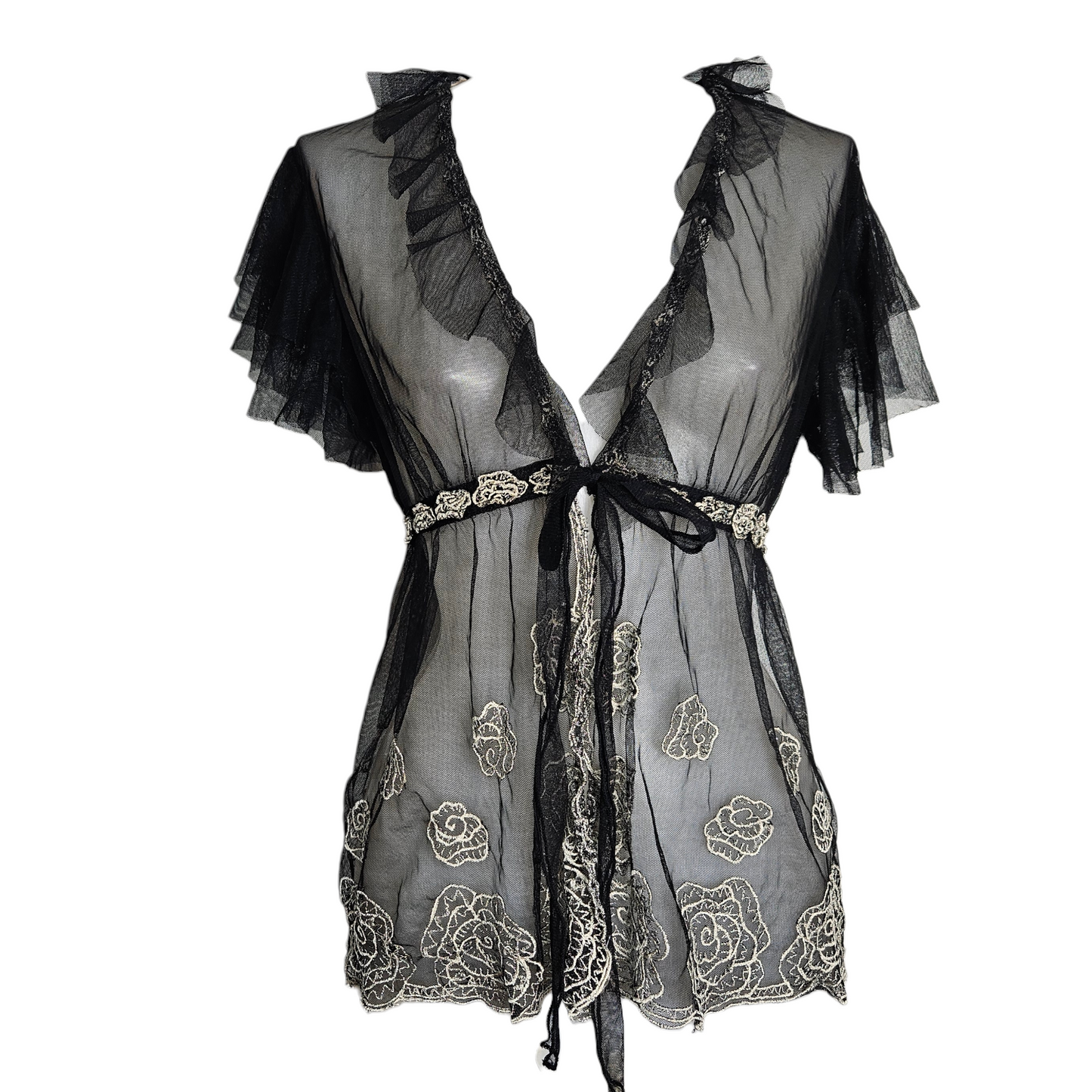 Sheer black embroidered mesh top with ruffled sleeves and tie front, romantic fairycore and whimsigoth vintage vibe, delicate floral details.