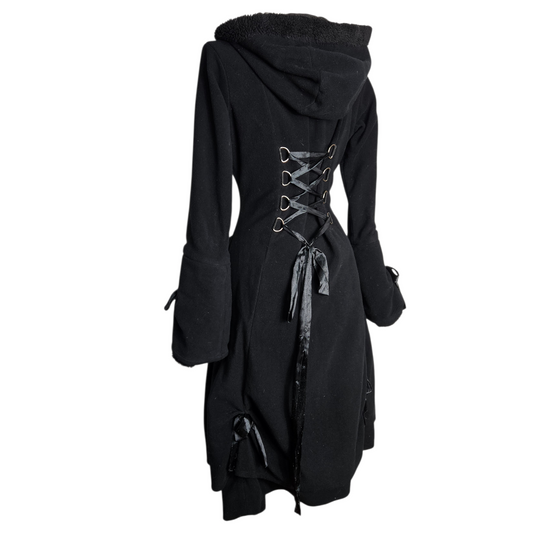 Black gothic style long coat with corset lace-up back, hood and ribbon details, whimsigoth fairycore vibe, dramatic silhouette and dark romantic aesthetic.