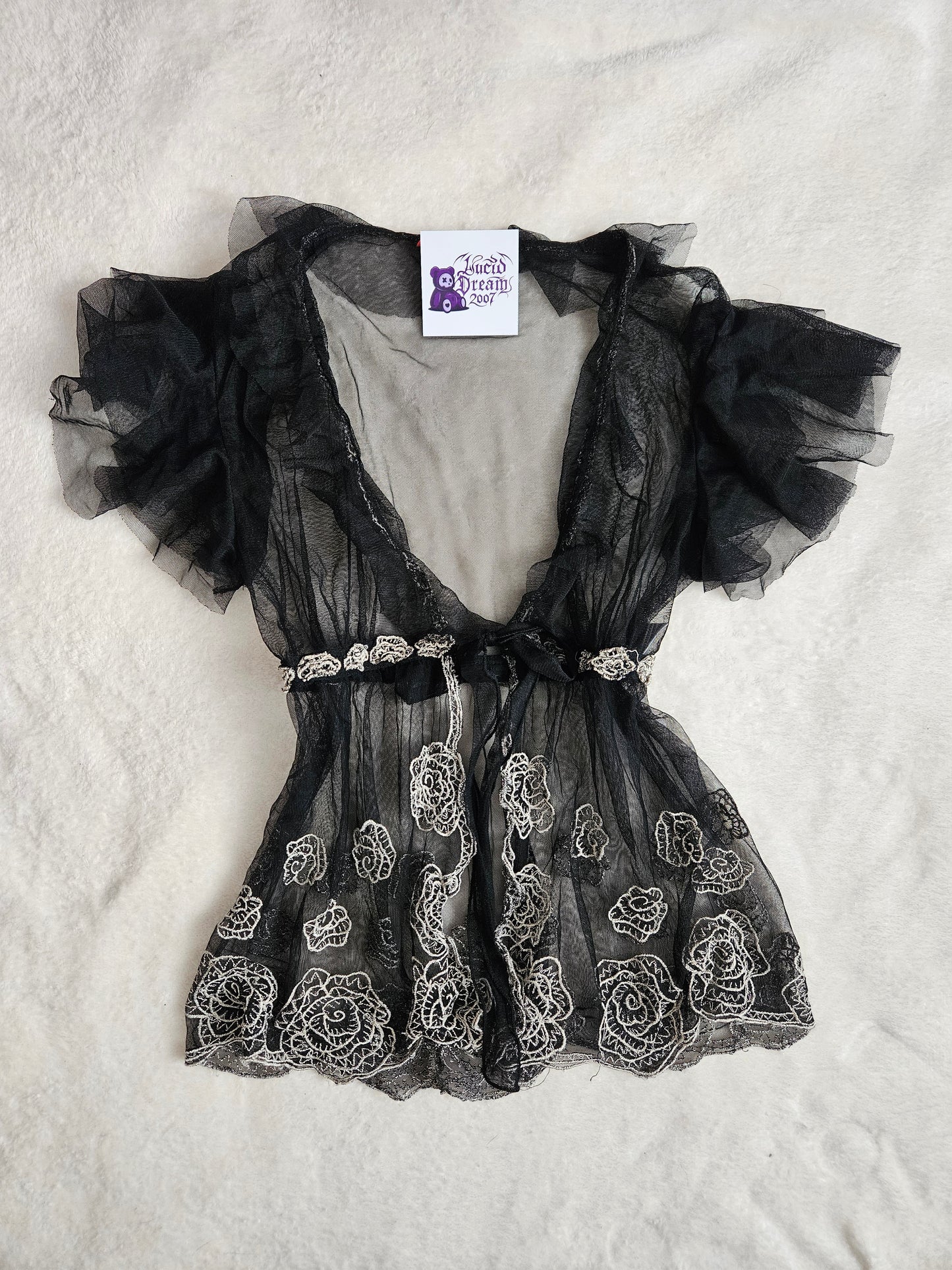 Haut en voile René Derhy