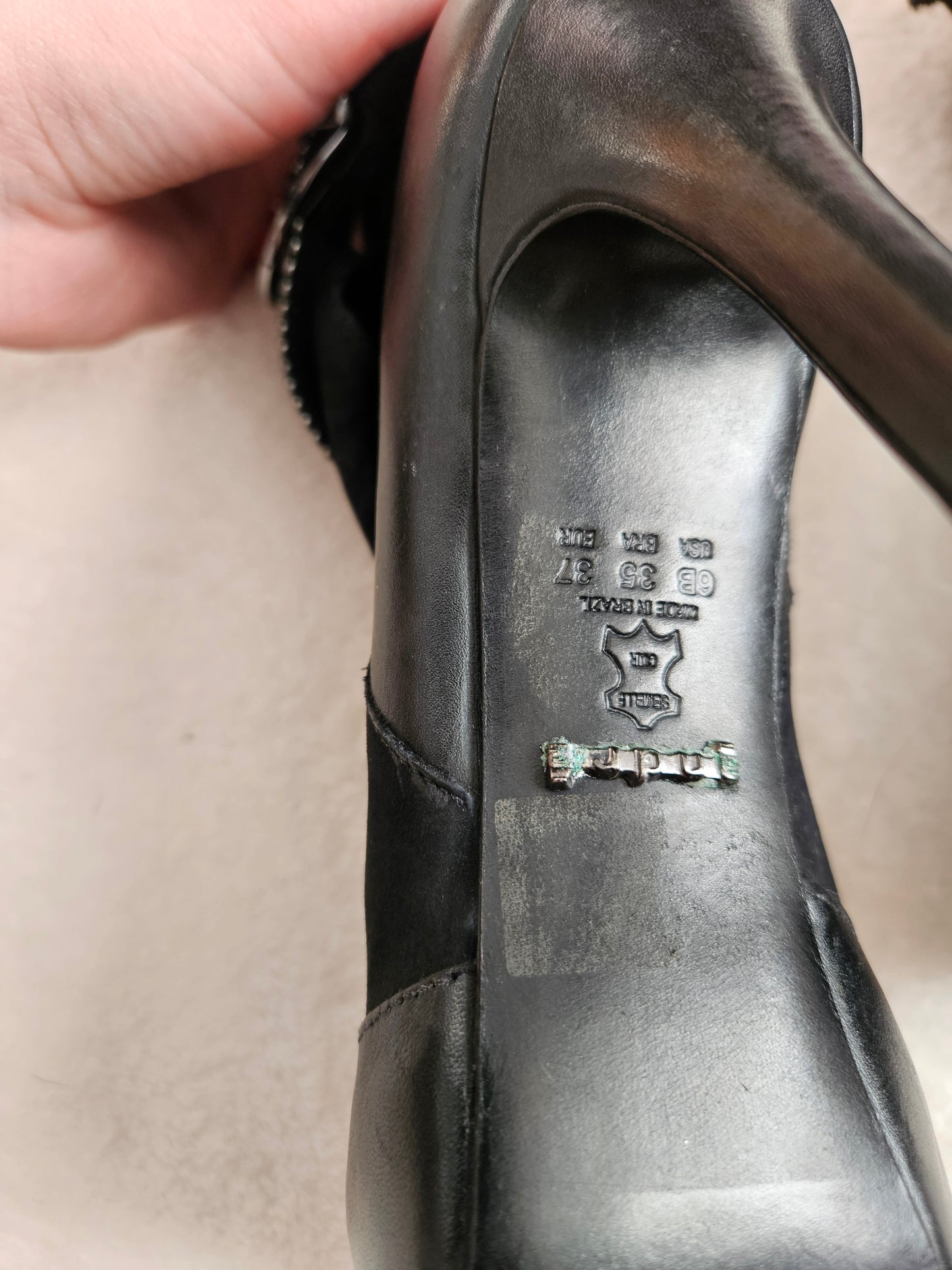 High-heeled shoes with strap details