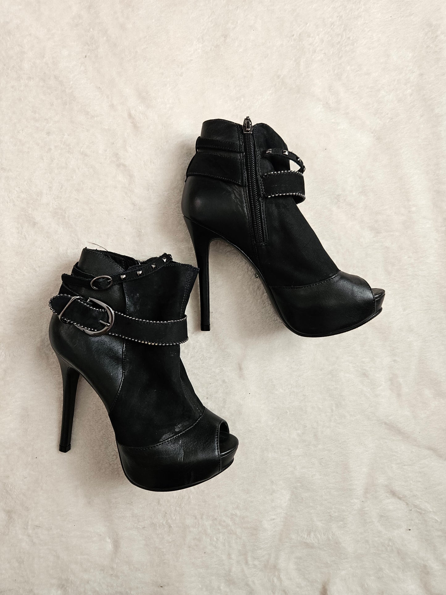 High-heeled shoes with strap details