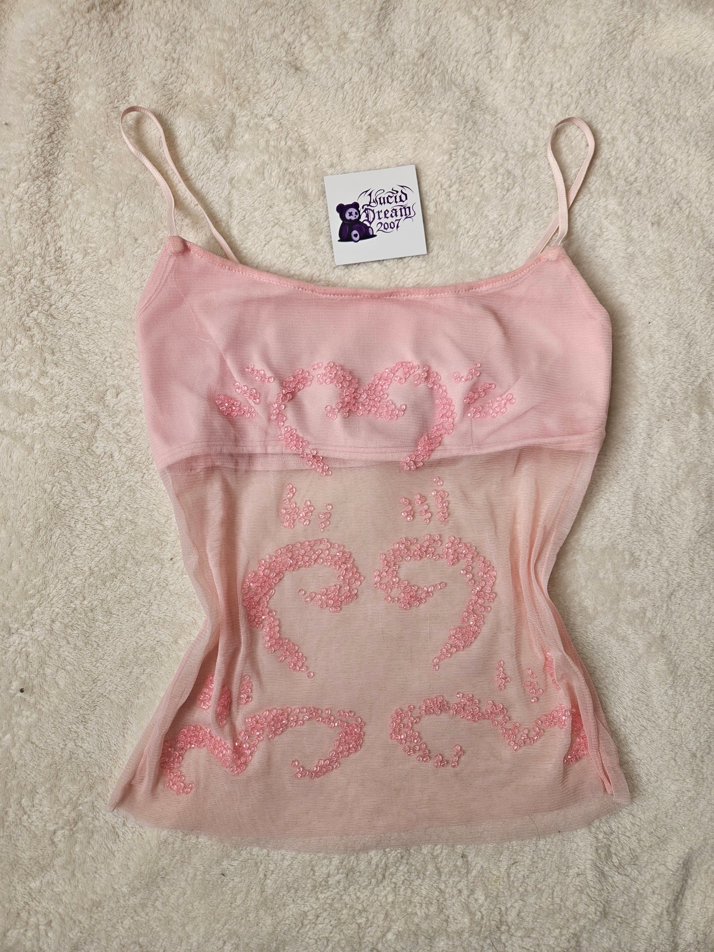Haut rose en voile brodé