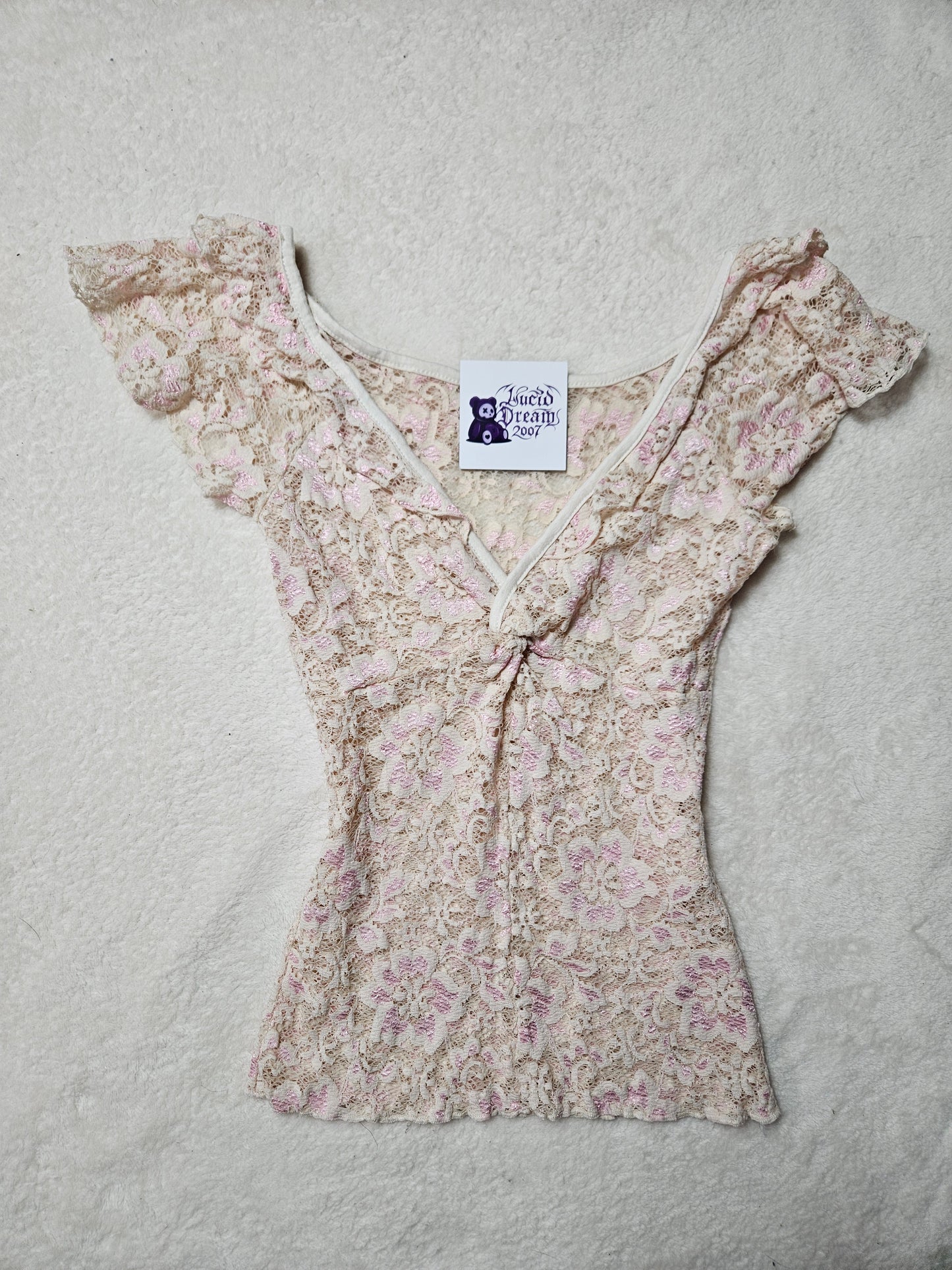 Haut en dentelle tons beige et rose