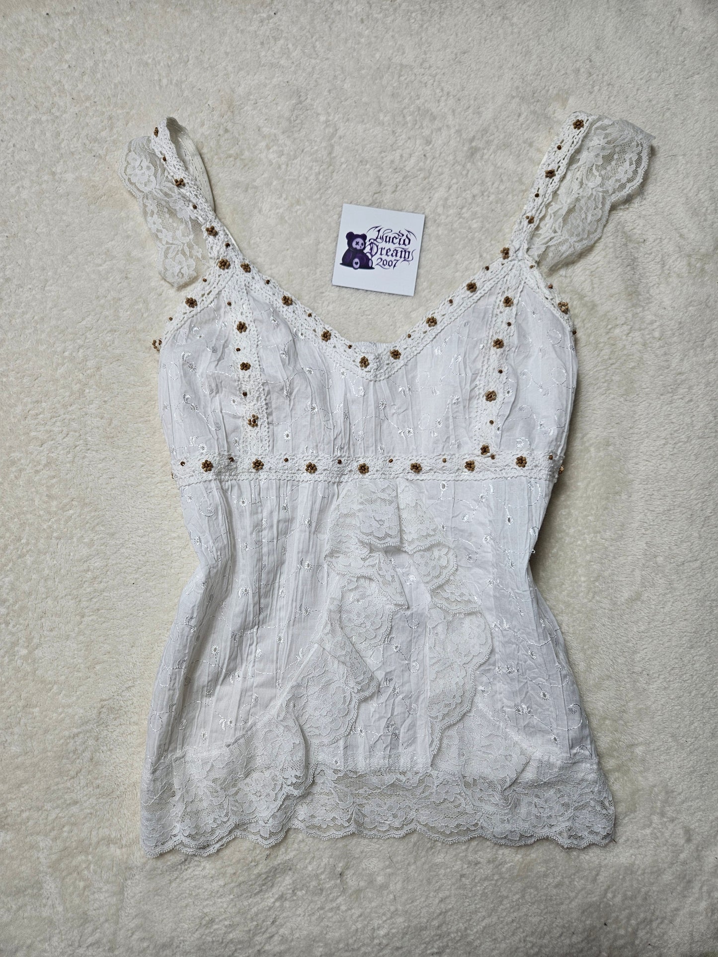 Top blanco con volantes