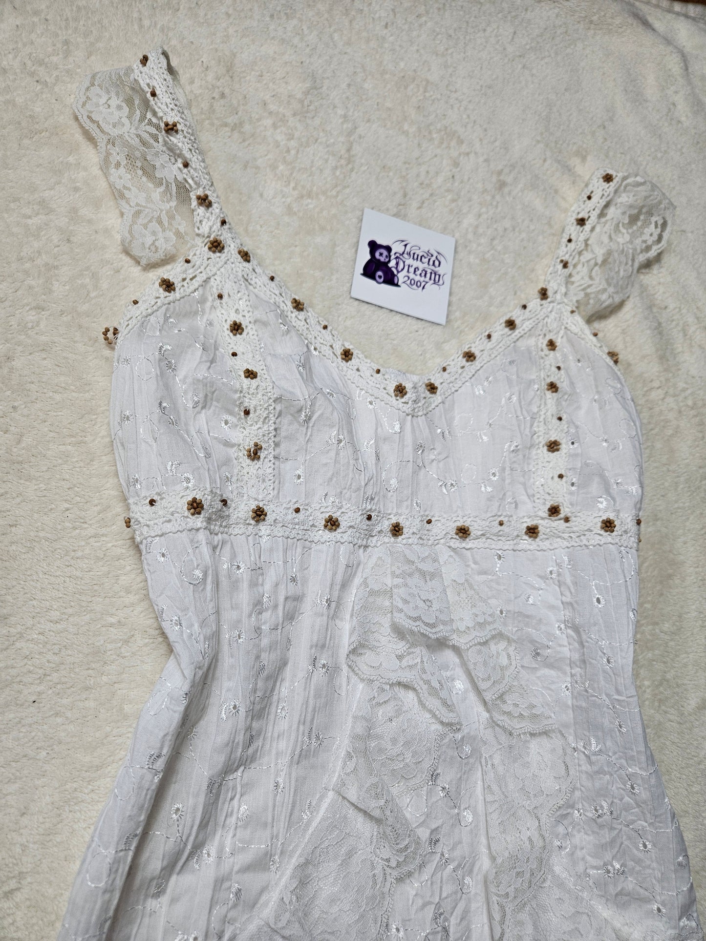 Top blanco con volantes