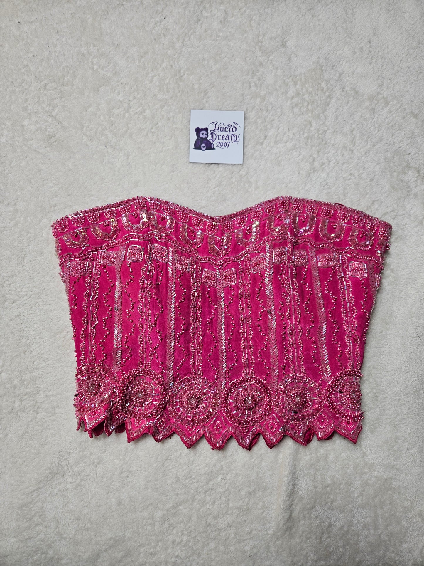Corsé rosa bordado