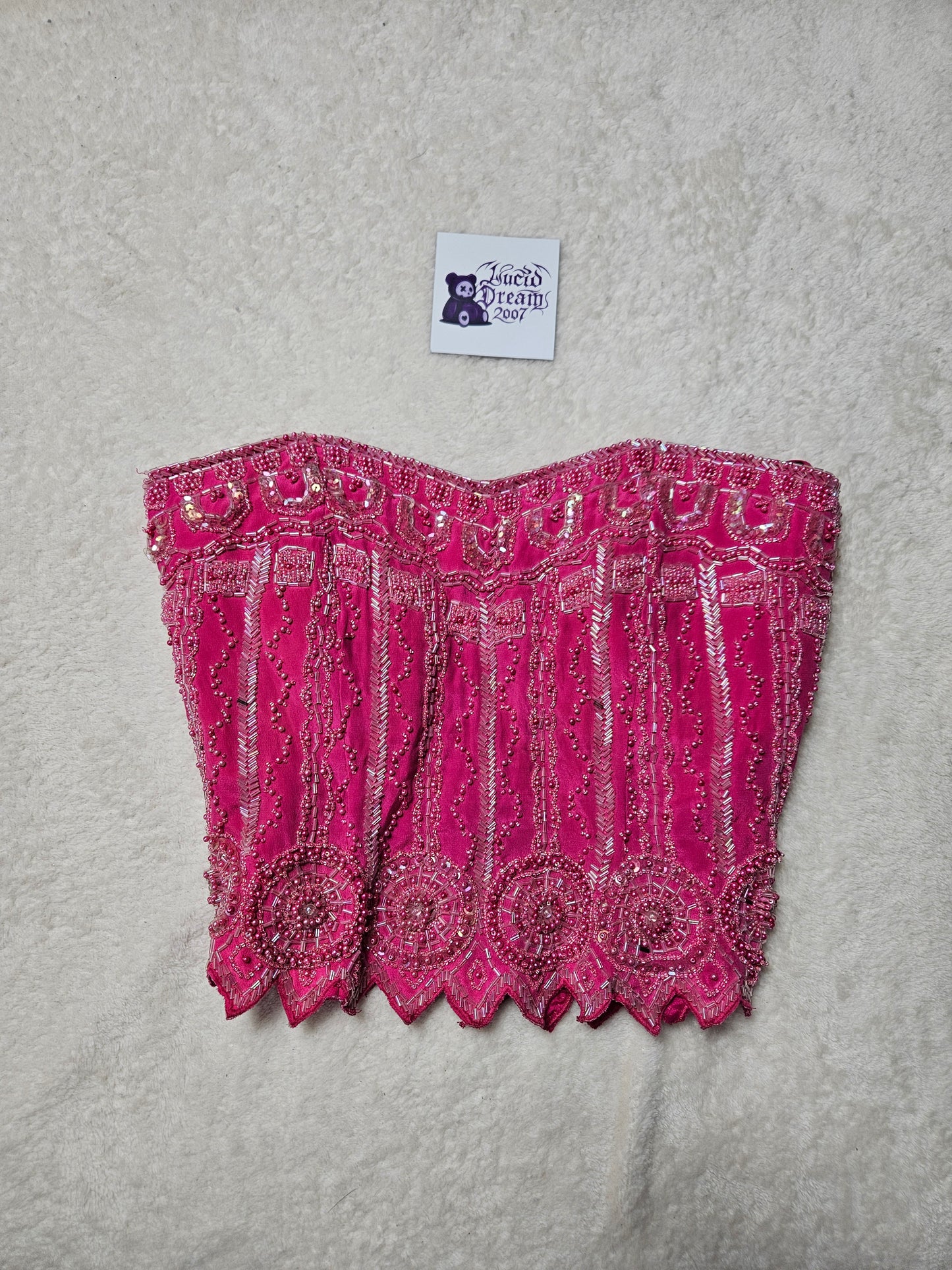 Corsé rosa bordado