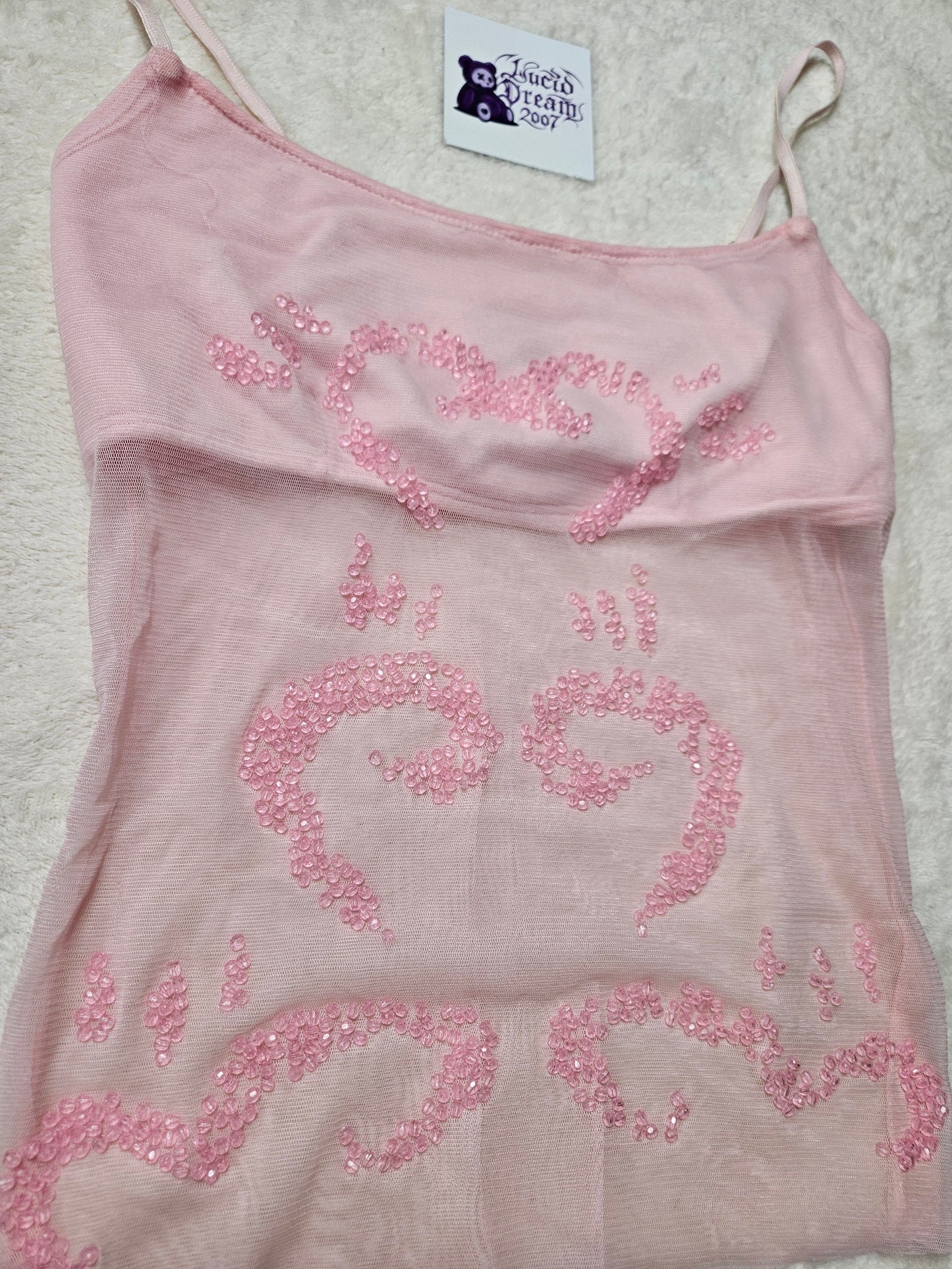 Haut rose en voile brodé
