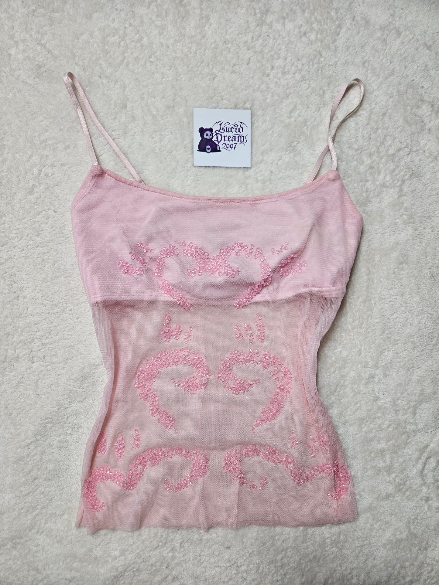 Haut rose en voile brodé