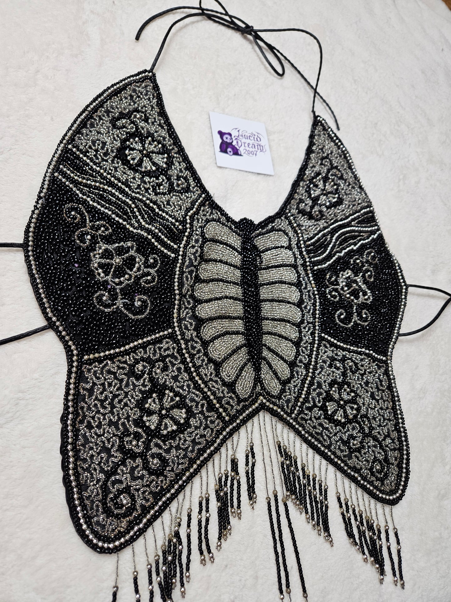 Dos nu papillon brodé de perles et sequins