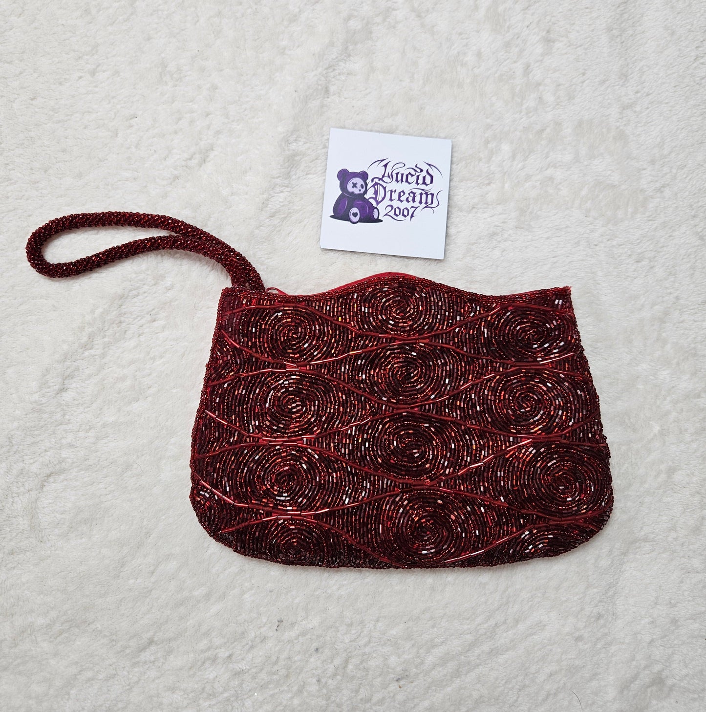 Pochette bordeaux perles et sequins