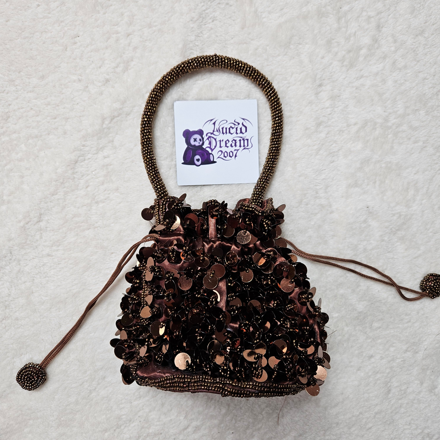 Petite besace marron à sequins