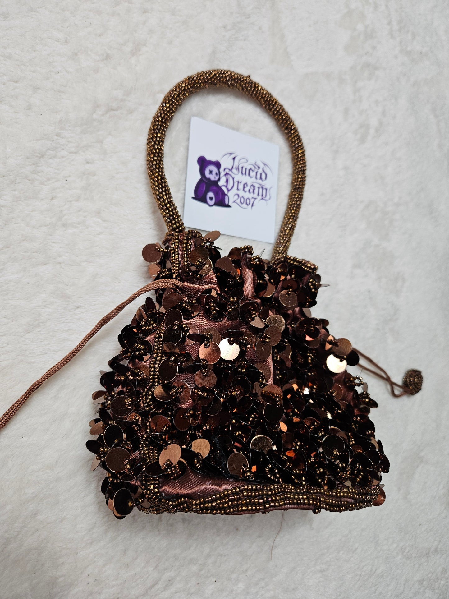 Petite besace marron à sequins