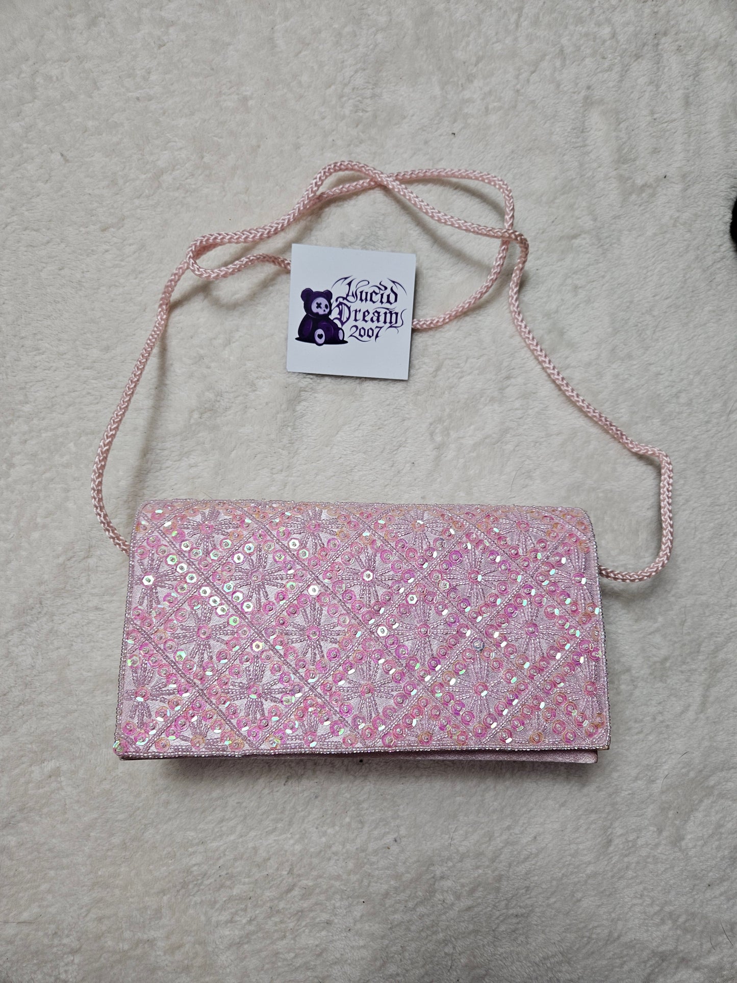 Pochette rose à sequins