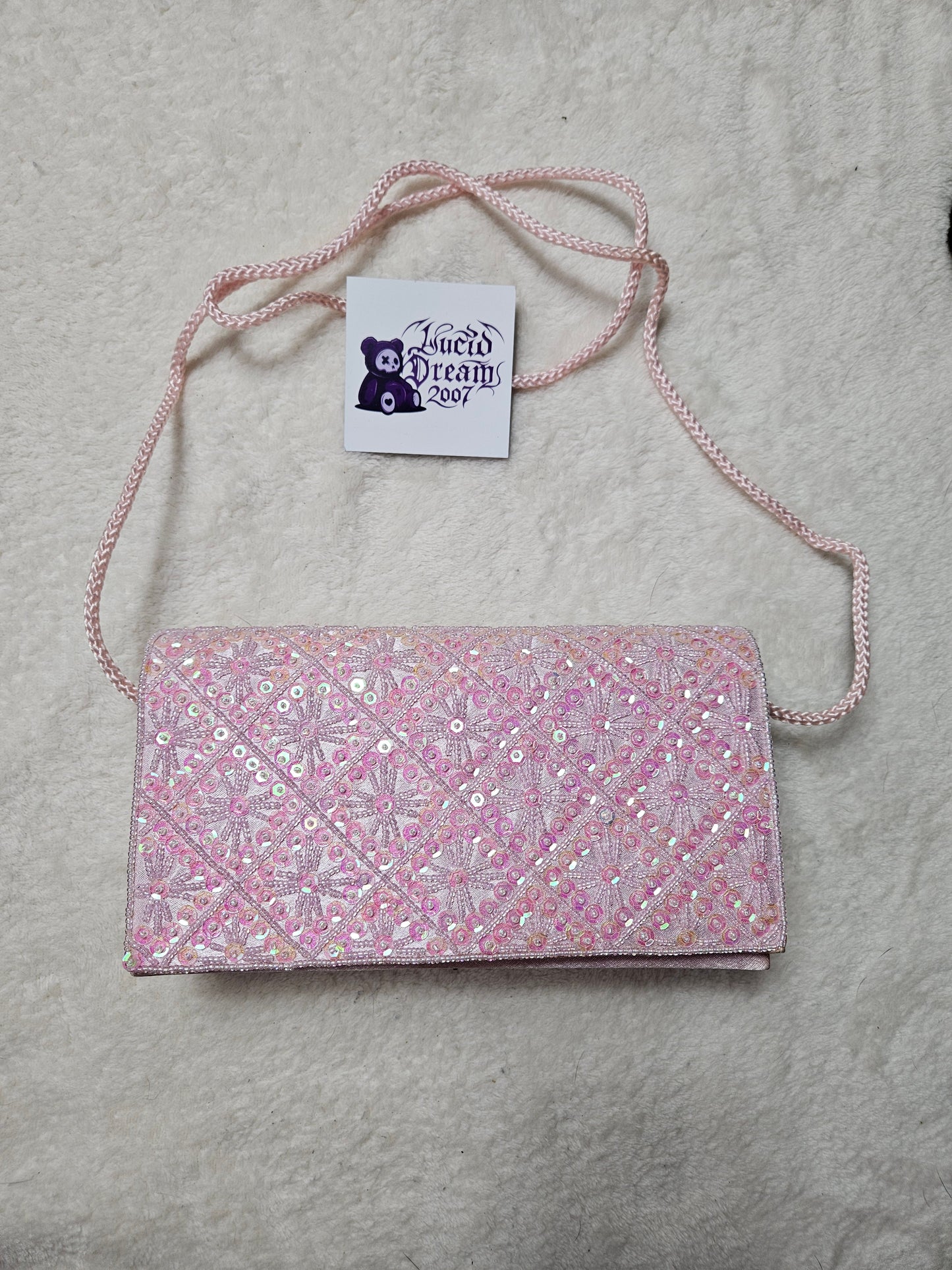 Pochette rose à sequins