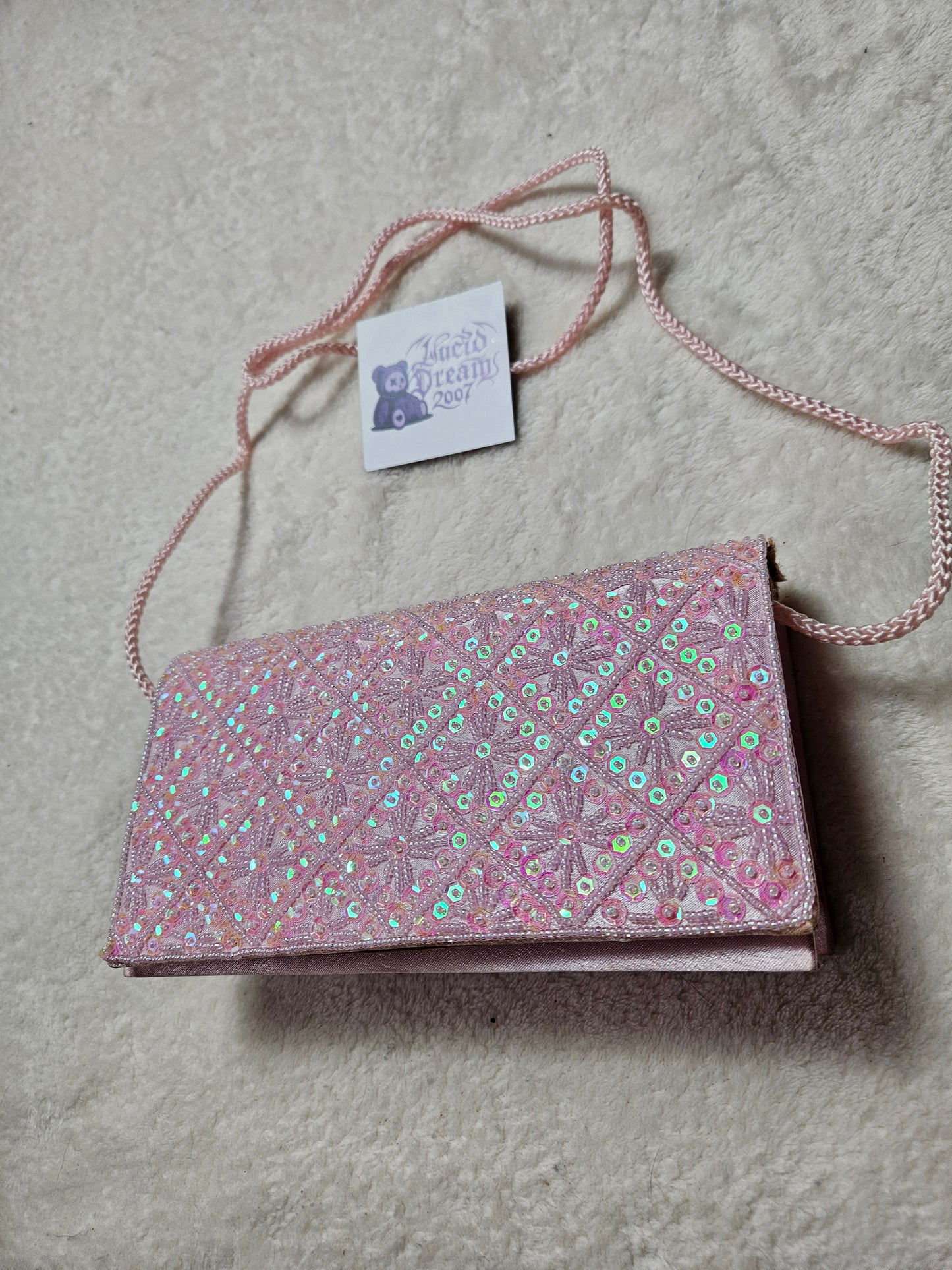 Pochette rose à sequins