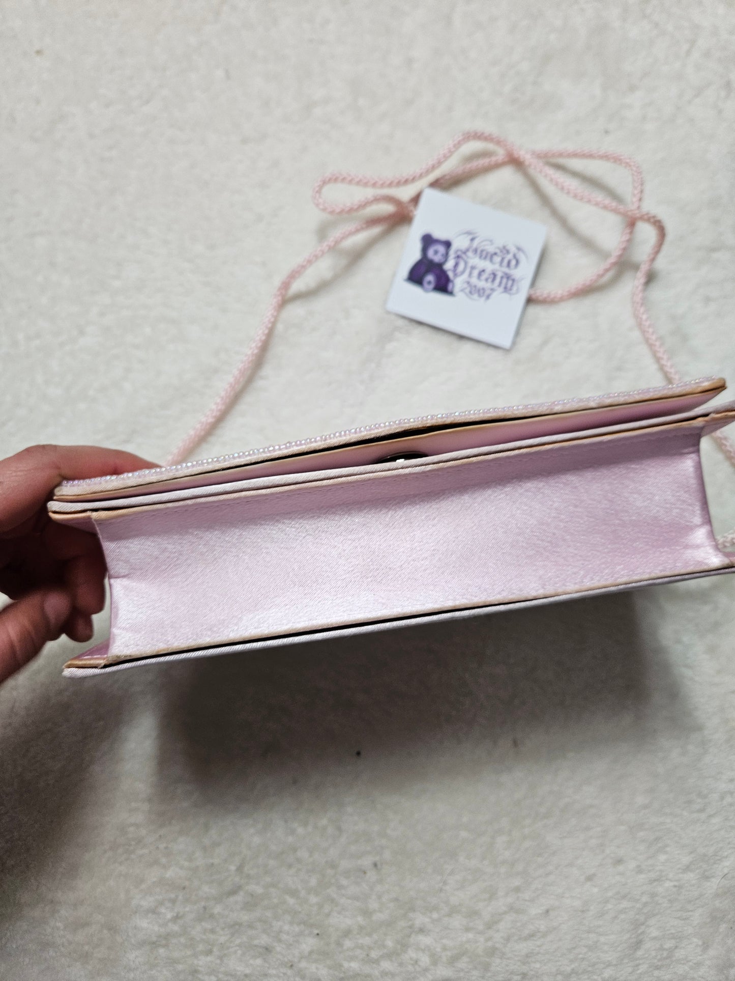 Pochette rose à sequins