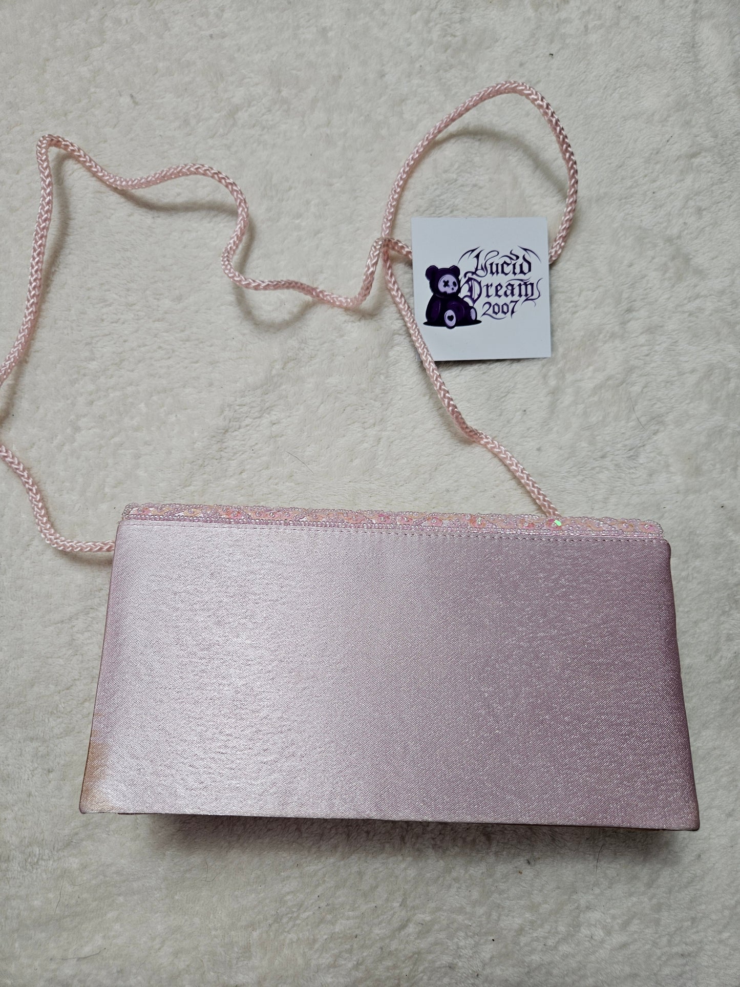 Pochette rose à sequins