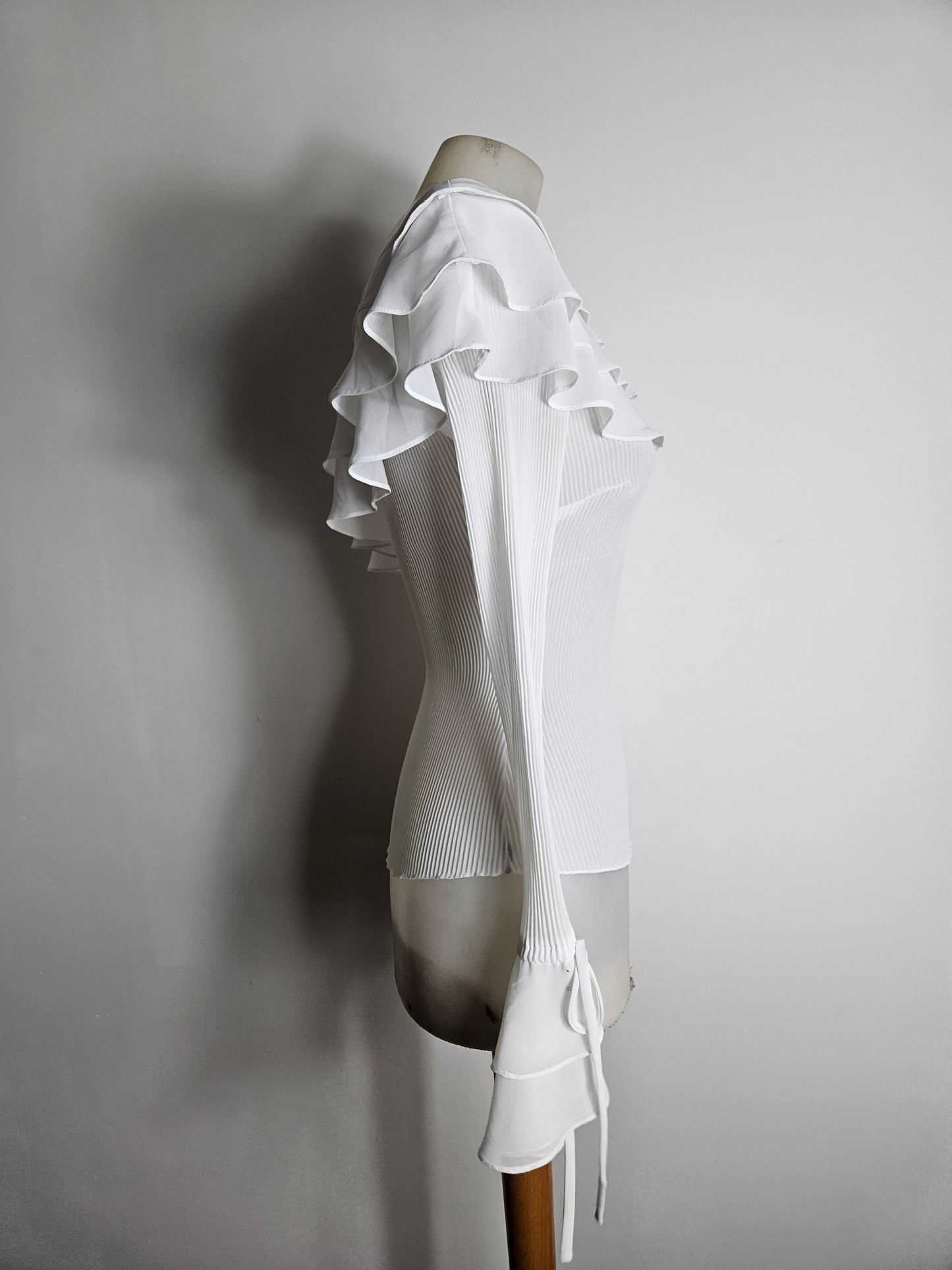 Asymmetrical voile top with ruffles