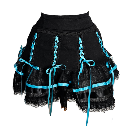 Vintage black mini skirt with turquoise ribbon lacing and lace ruffles, gothic Y2K Living Dead Souls piece by Lucid Dream 2007.