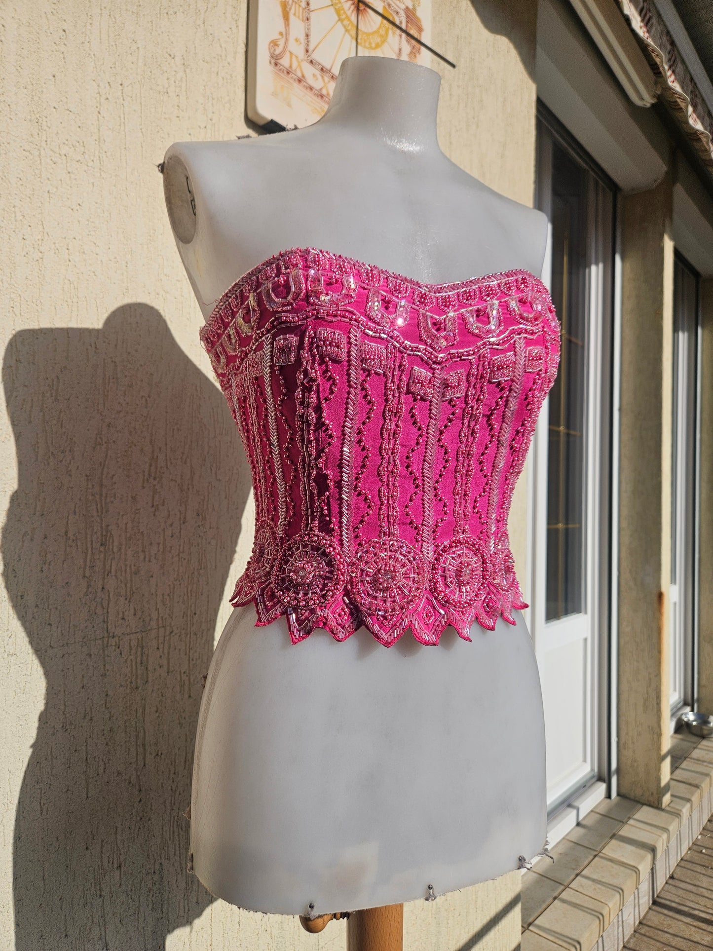 Corsé rosa bordado
