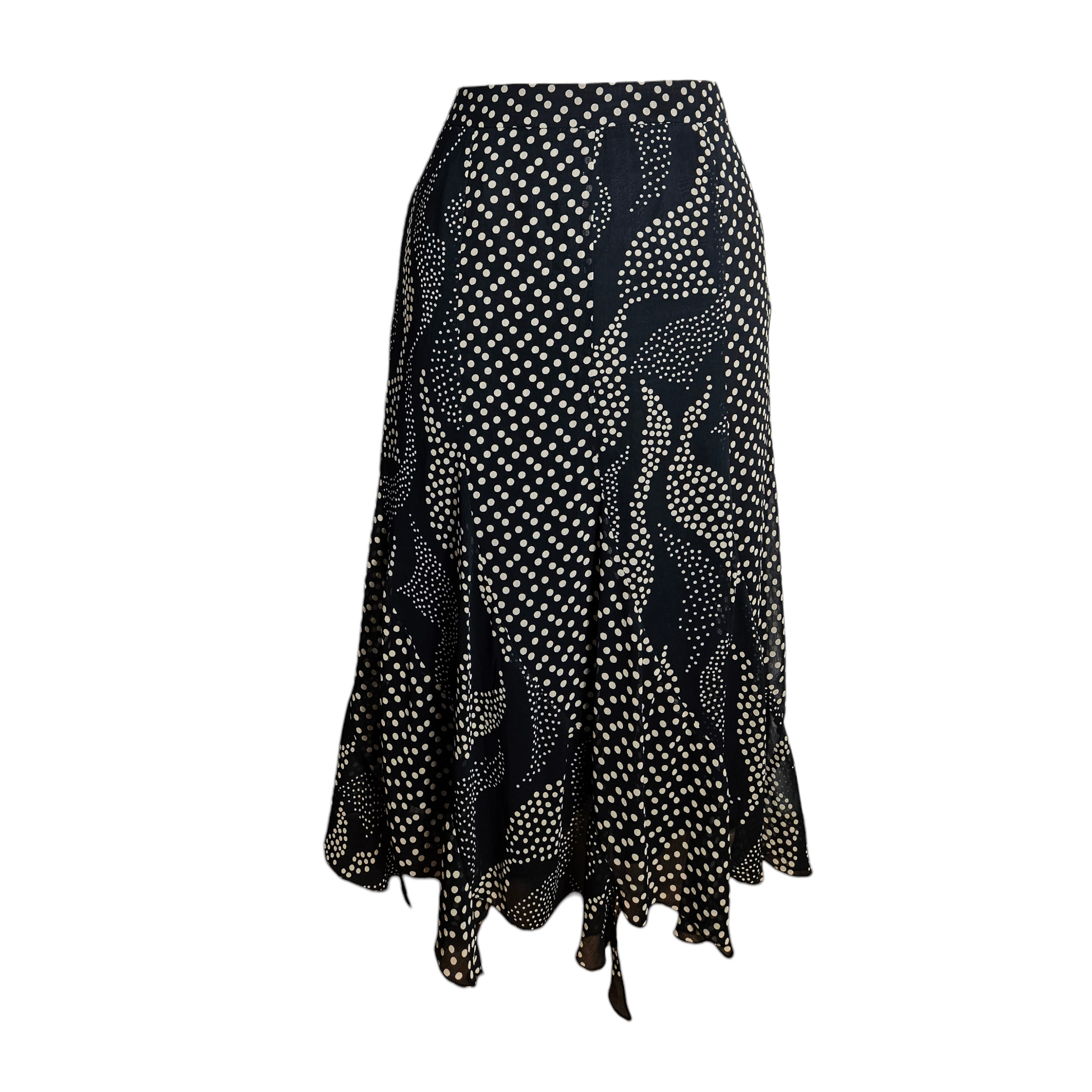 Vintage black polka dot midi skirt with flowing wavy pattern and flared hem, elegant Y2K retro silhouette with whimsical fairycore and romantic vintage vibes.