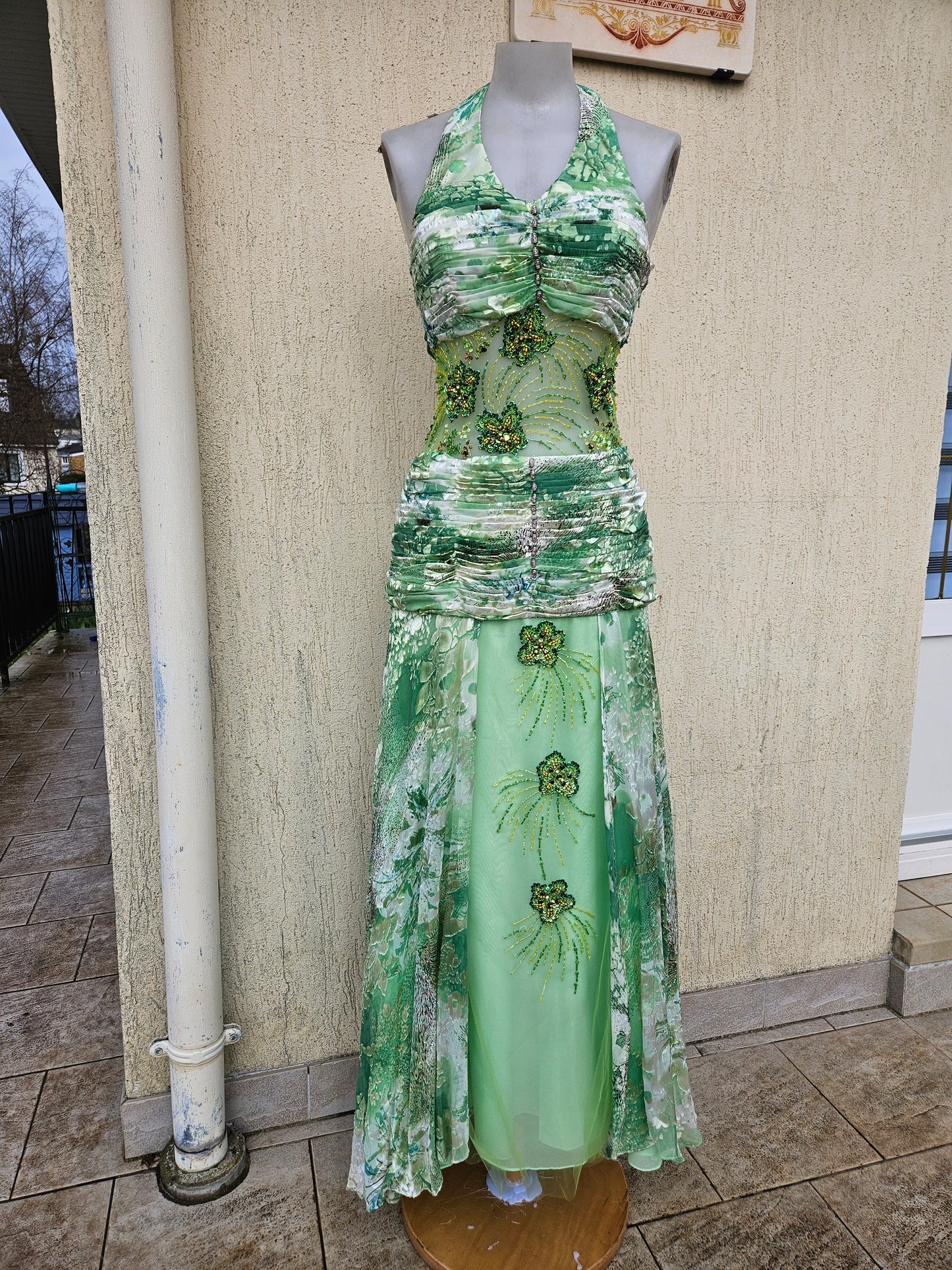 Green silk dress embroidered with beads