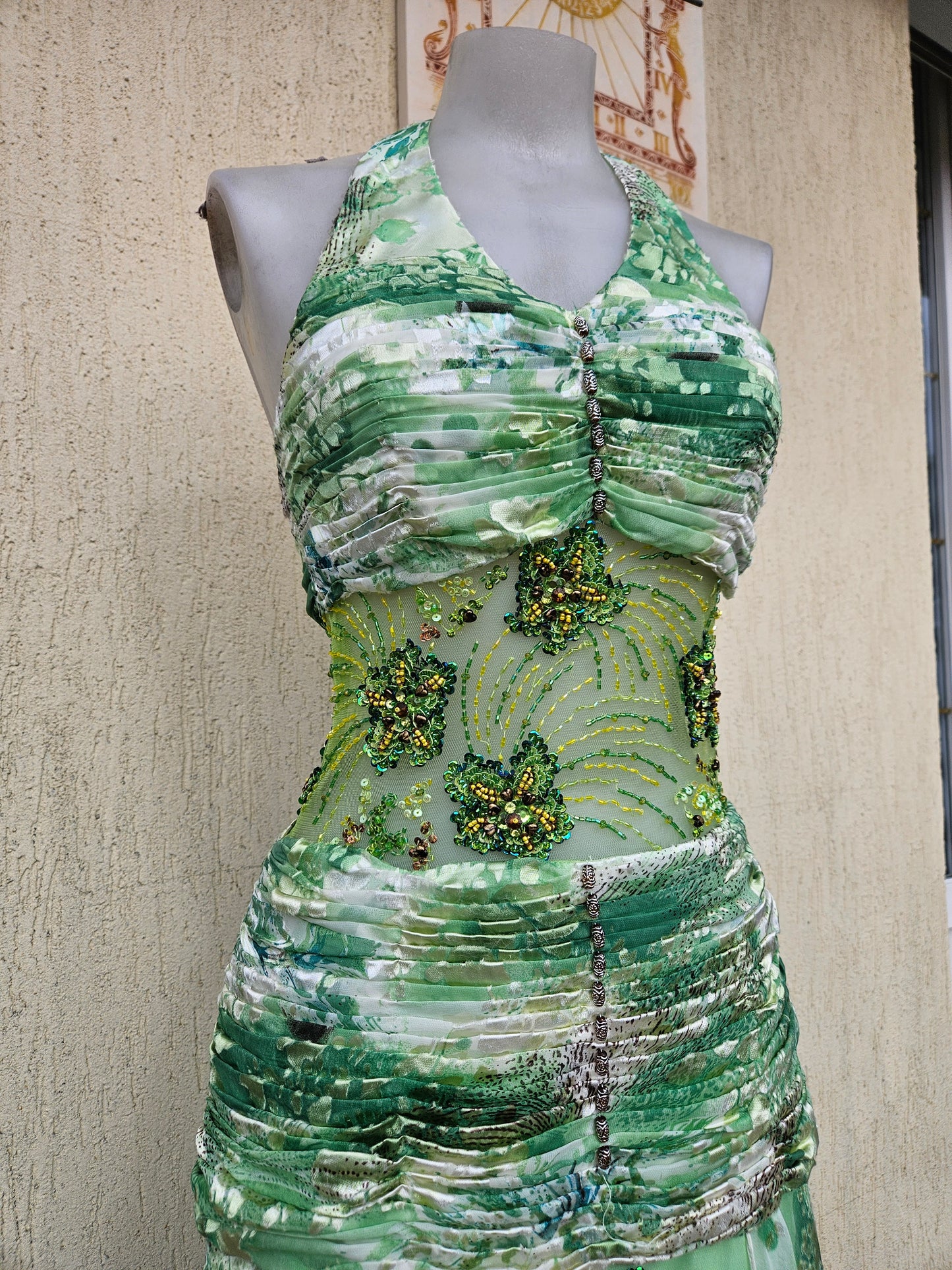 Green silk dress embroidered with beads