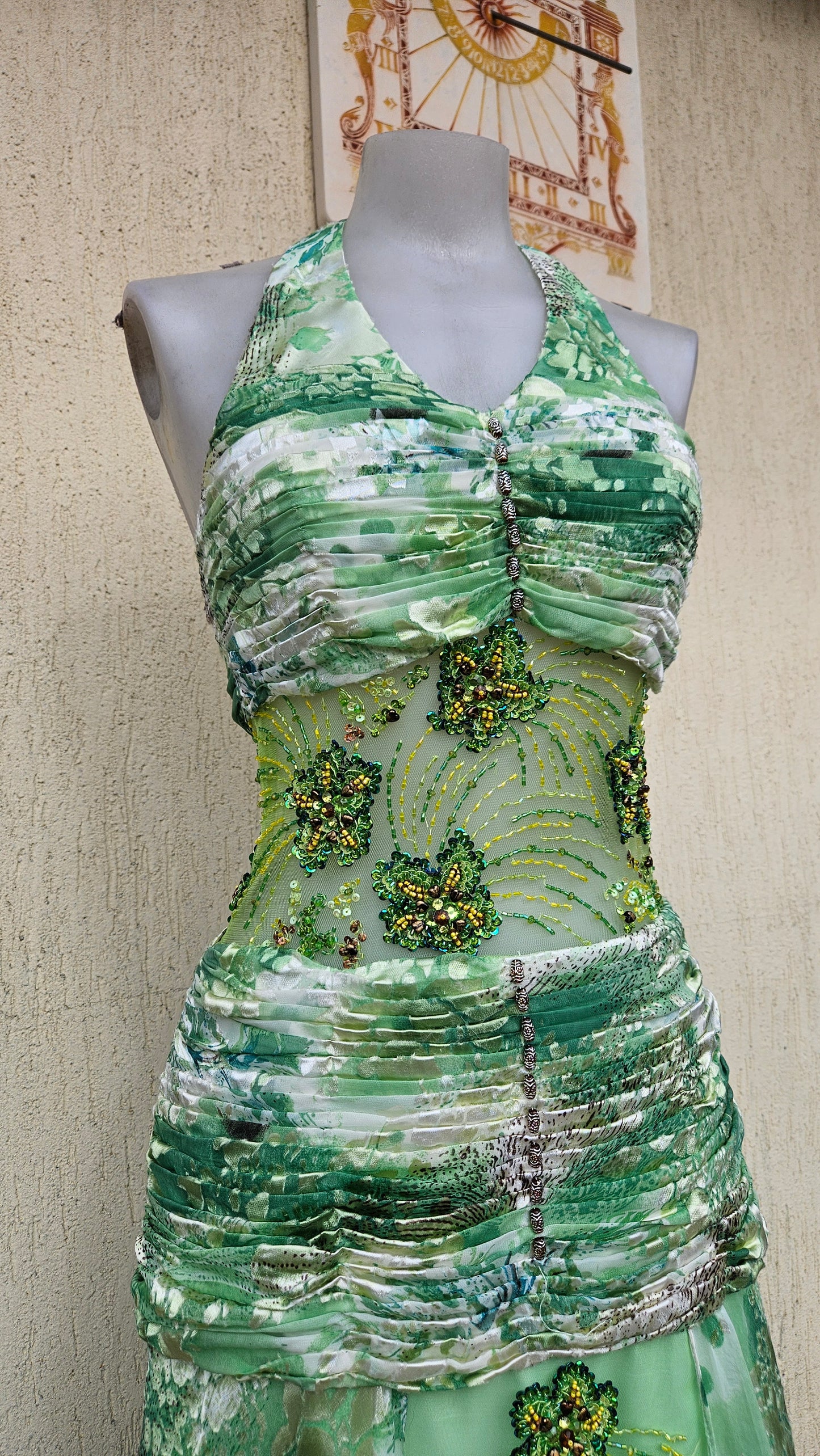 Green silk dress embroidered with beads