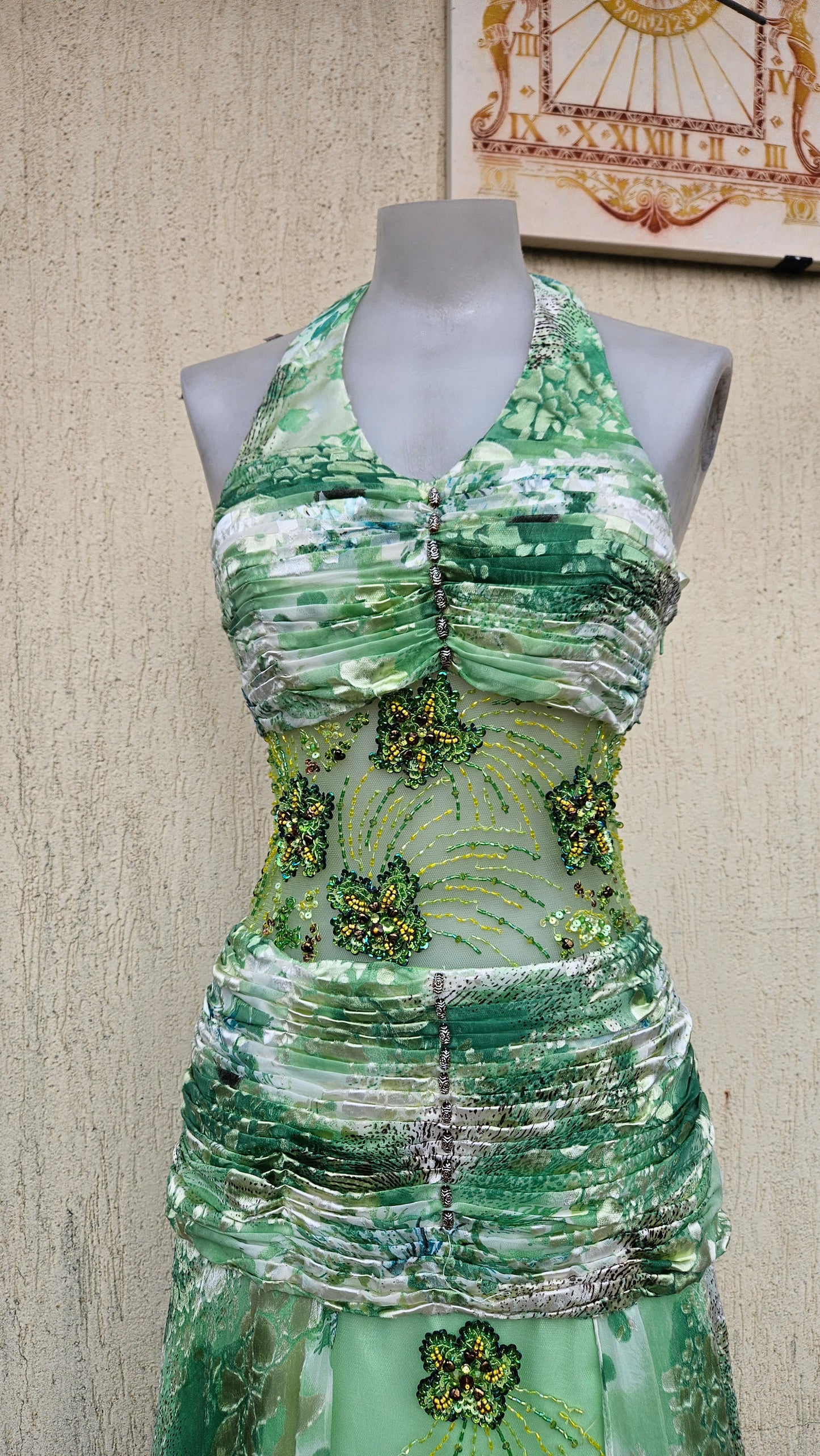 Green silk dress embroidered with beads