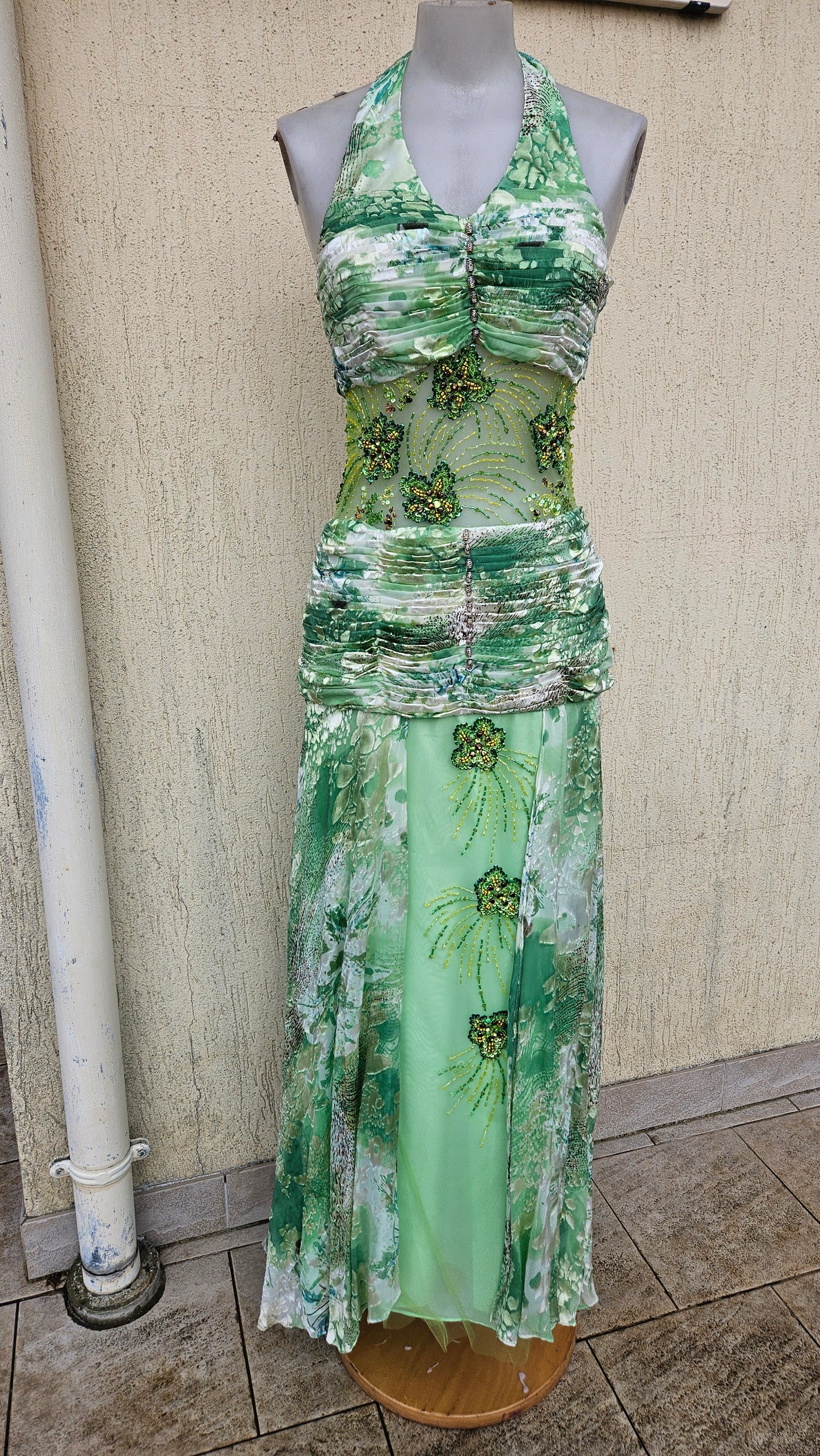 Green silk dress embroidered with beads