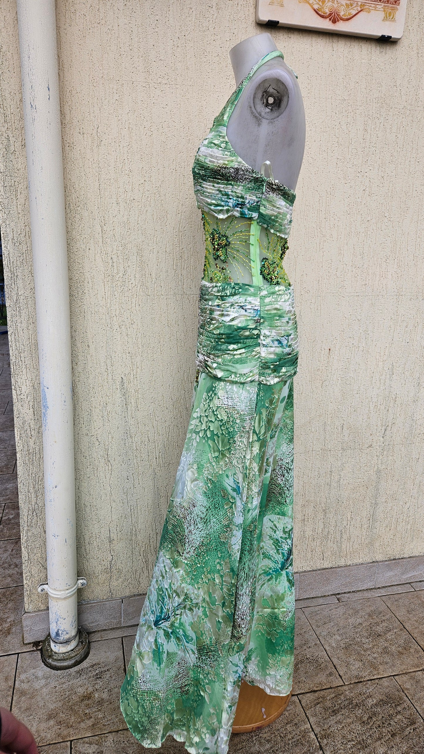 Green silk dress embroidered with beads