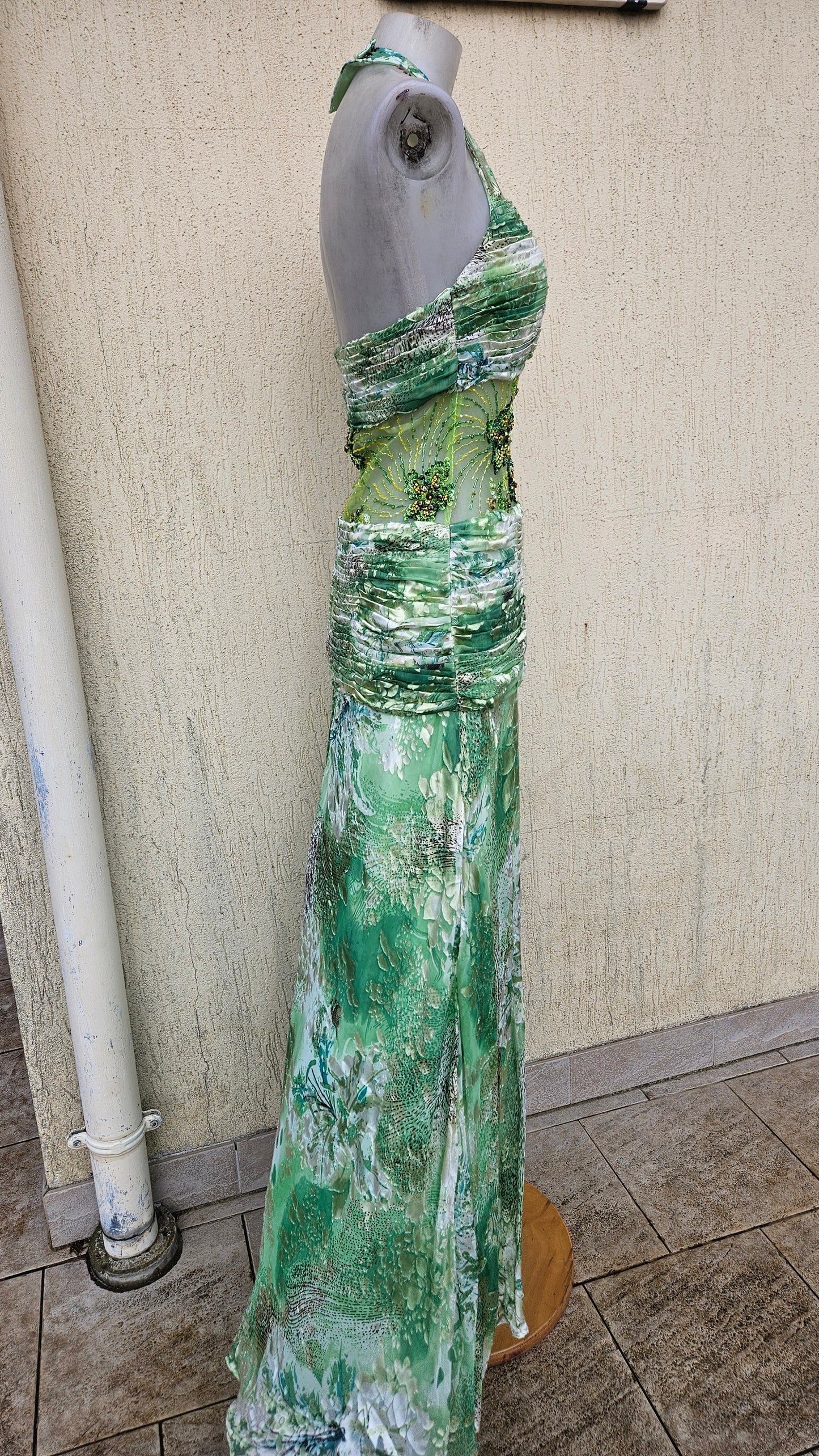Green silk dress embroidered with beads